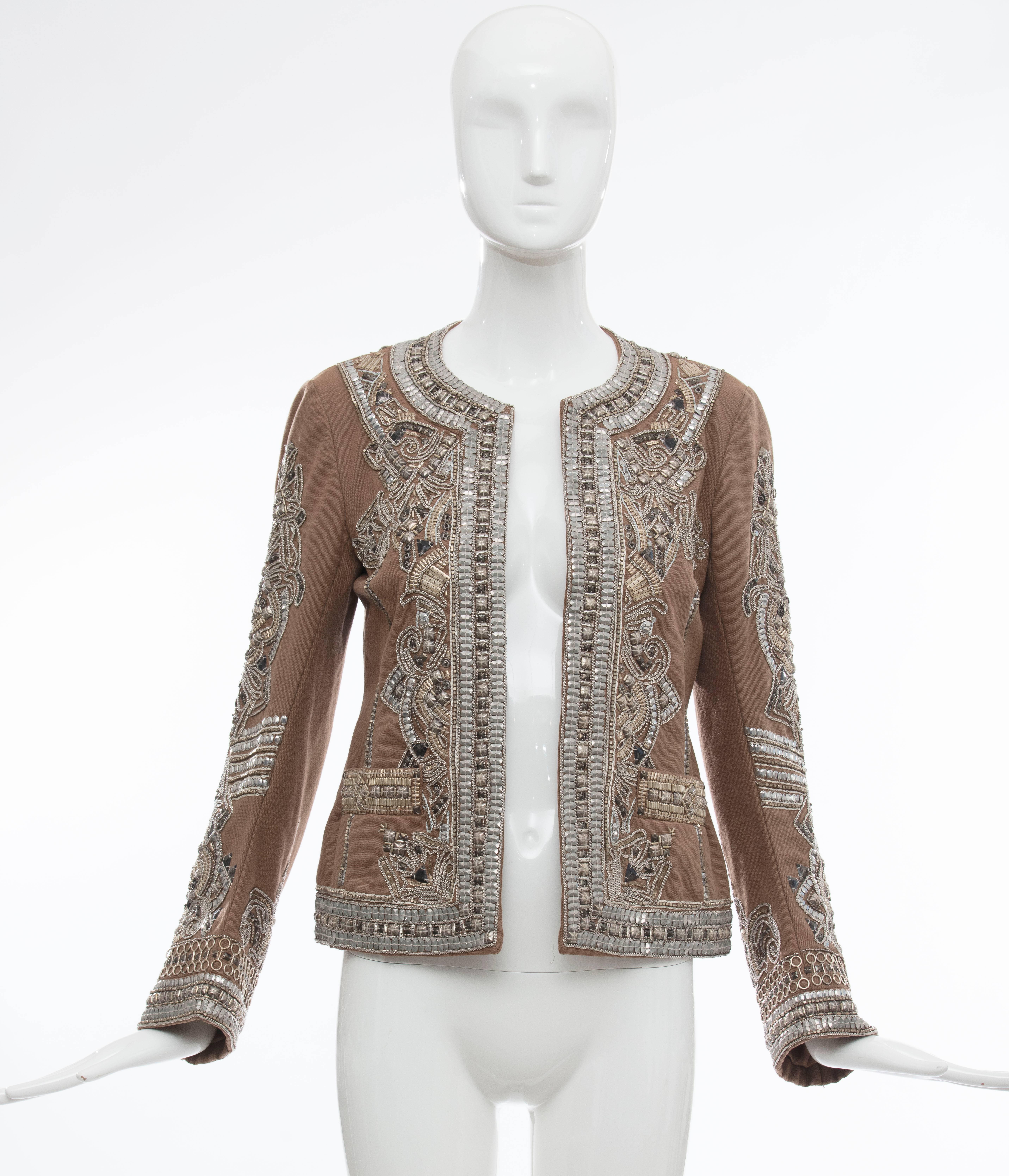 Dries Van Noten, Autumn-Winter 2008 cotton embroidered jacket with silver Indian thread, mandarin collar, dual welt pocket at sides and open at front.

IT. 36
US. 4

Bust: 33, Waist 32, Shoulder 15, Length 21.5, Sleeve 26.5

