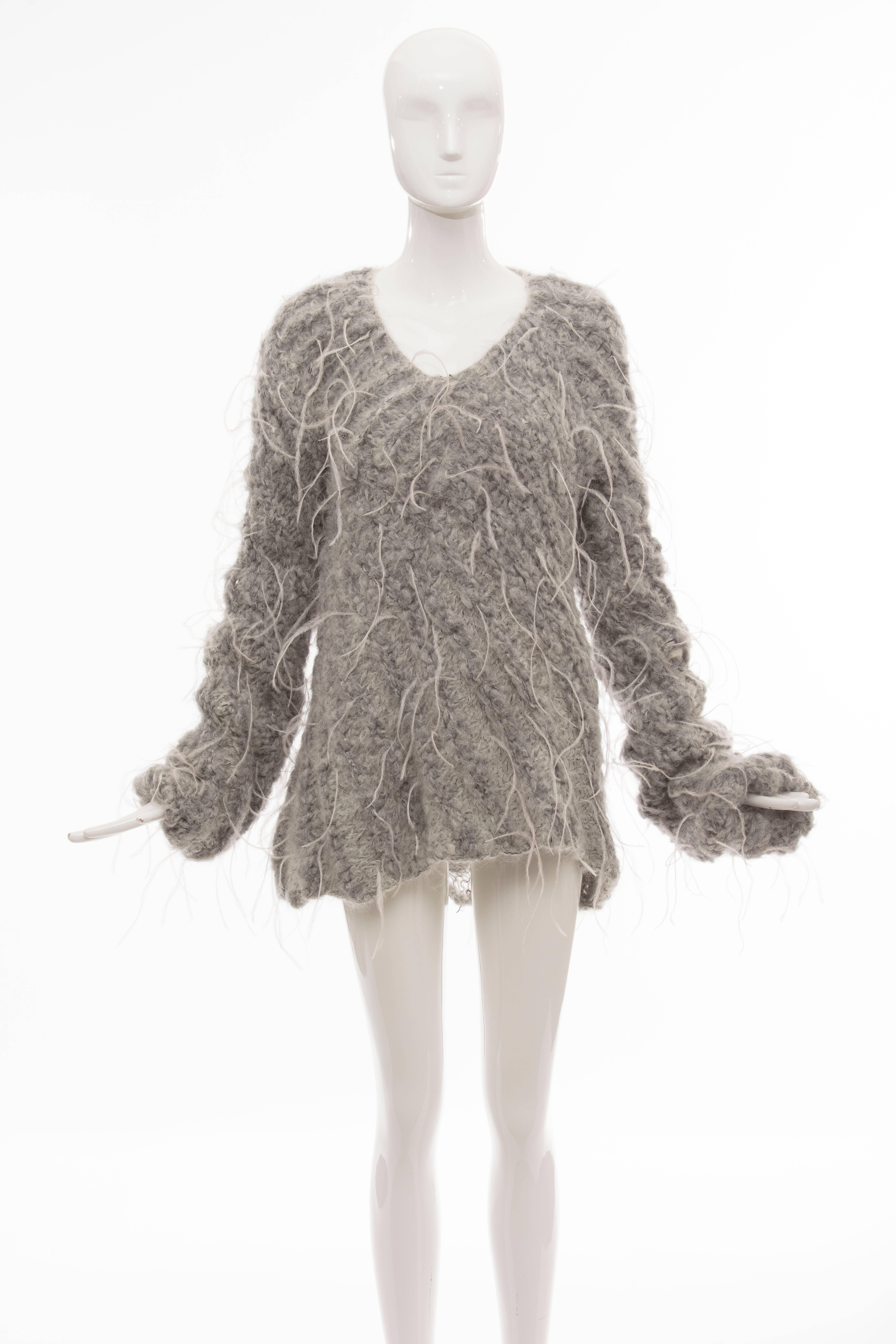 Olivier Theyskens for Nina Ricci oversize alpaca and mohair sweater with ostrich feathers throughout, V-neck and exaggerated long sleeves. 

No Size Label

Bust: 38, Waist 40, Length 30
