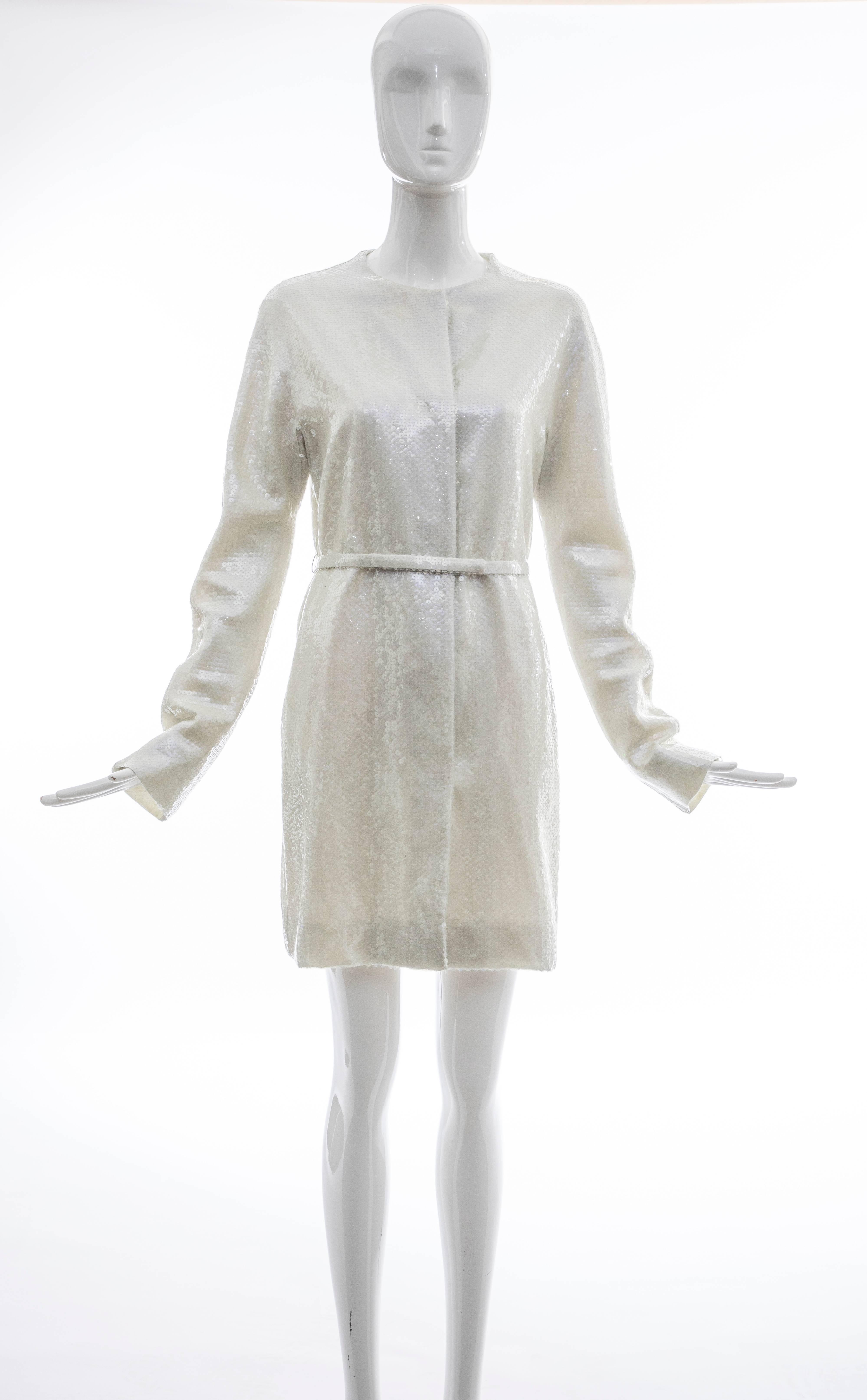 Raf Simons for Jil Sander, Spring 2007 runway (Look 46) pearlescent sequin button front evening lightweight coat with dual front pockets, self belt and fully lined in silk.

Bust 36, Waist 33, Hips 38, Length 35, Shoulder 16, Sleeve 37

EU. 38
US. 6