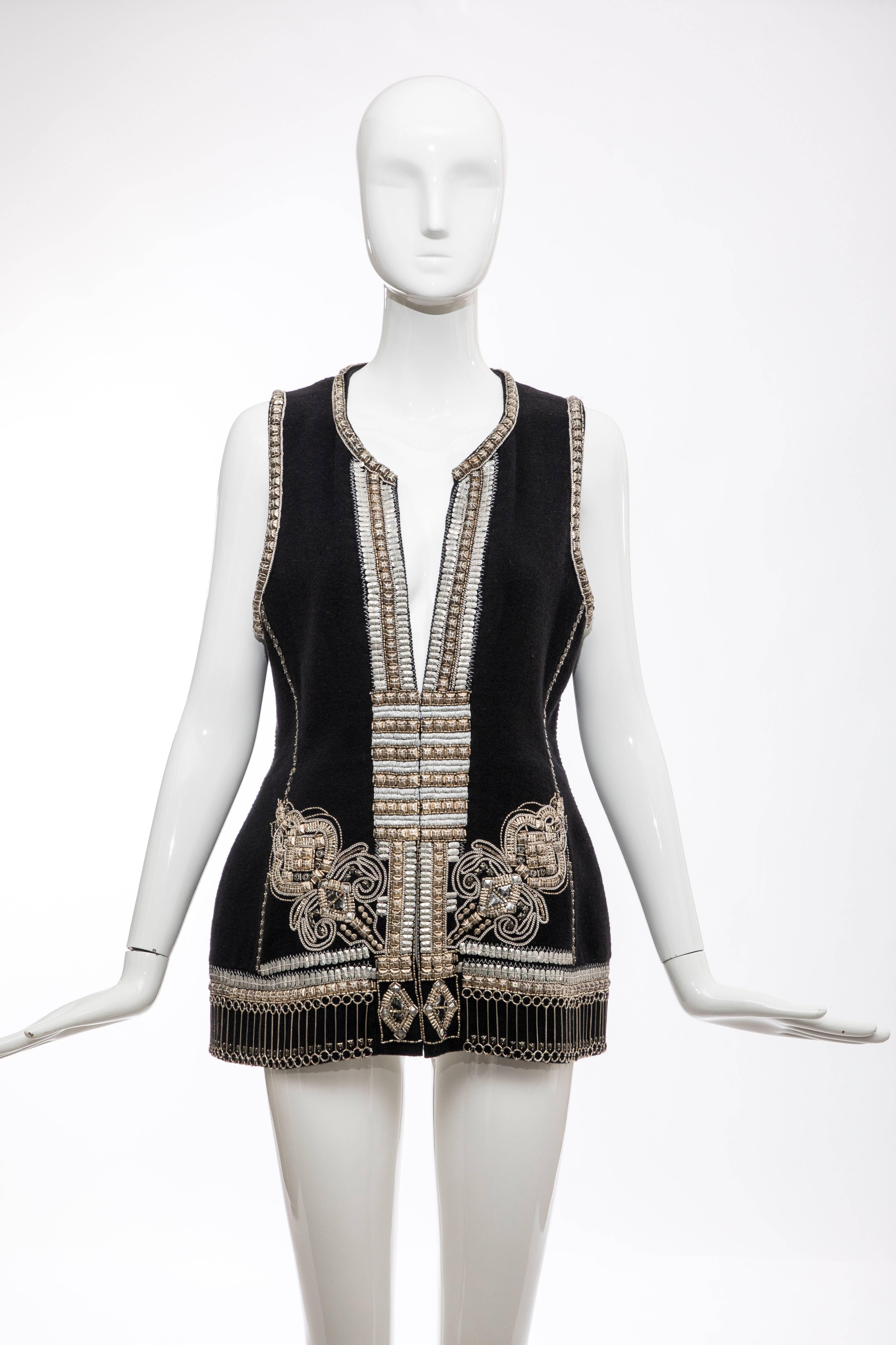 Dries Van Noten, Autumn-Winter 2010 runway black wool cashmere embroidered vest with silver Indian thread and hook-and-eye closure.

FR. 38
US. 6

Bust: 36, Waist 34, Length 26
