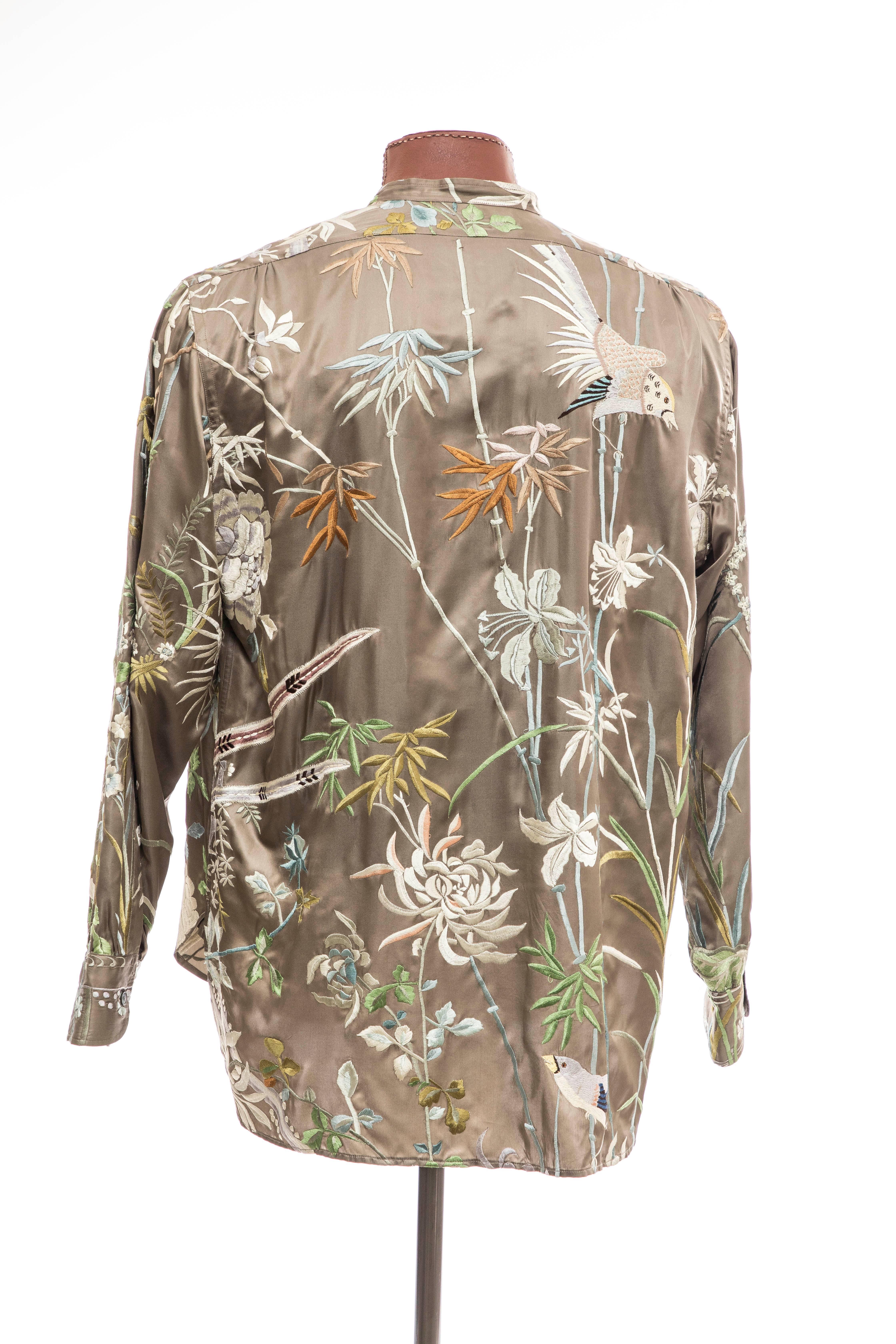 Tom Ford for Gucci, Spring-Summer 2003 men's silk floral embroidered button front shirt with mandarin collar.

Size: XL

Chest: 50, Length 33, Sleeve 36, Neck 16.5
