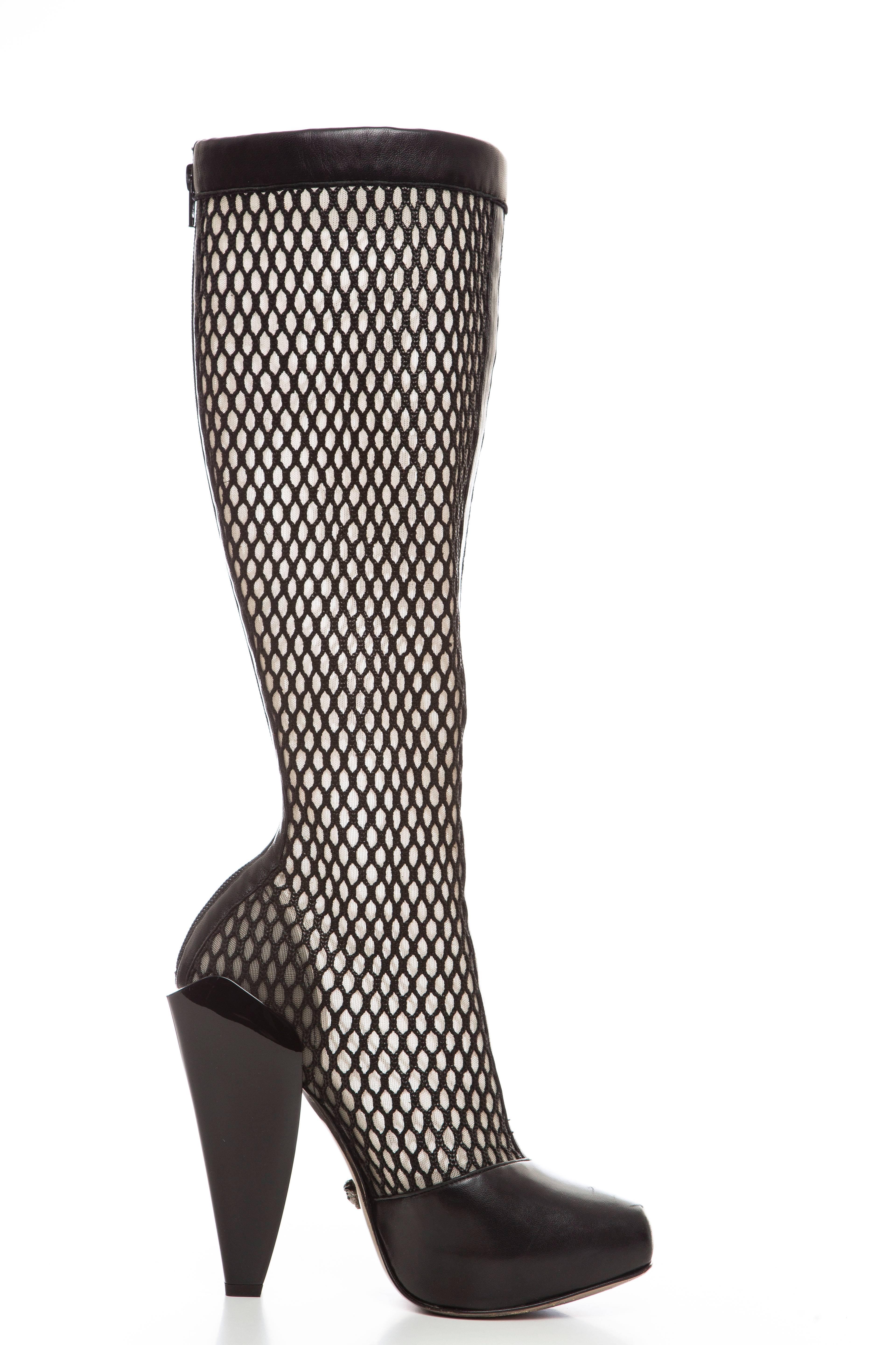Versace, Autumn - Winter 2012 black woven mesh boots with black leather trim, leather paneling at toe-box, zip closure at counter and poured architectural heels.