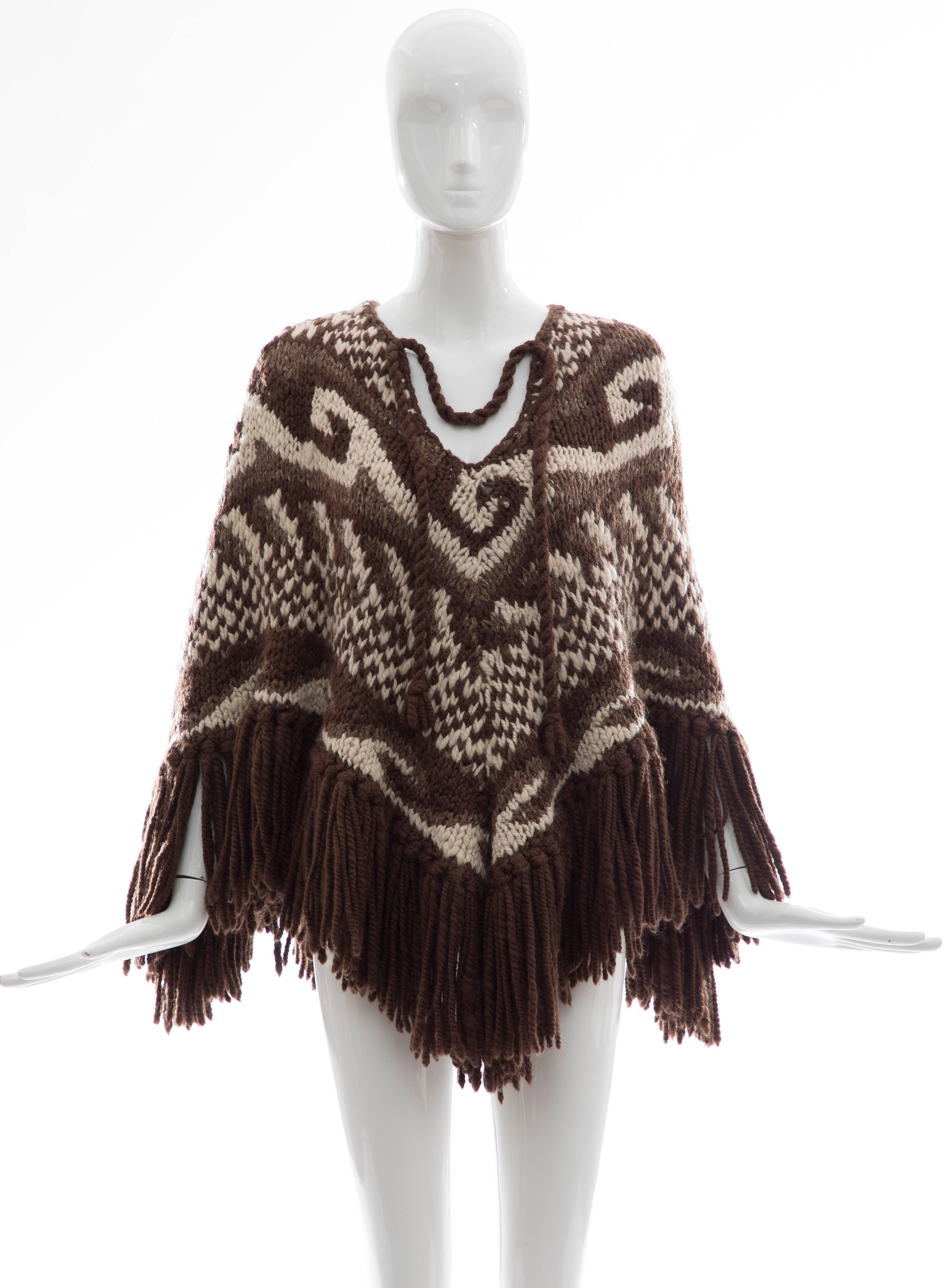 Dolce and Gabbana, Fall 2002, Runway(Look 37) wool alpaca knit poncho.

IT. Small

Bust 64, Shoulder 42, Length 29