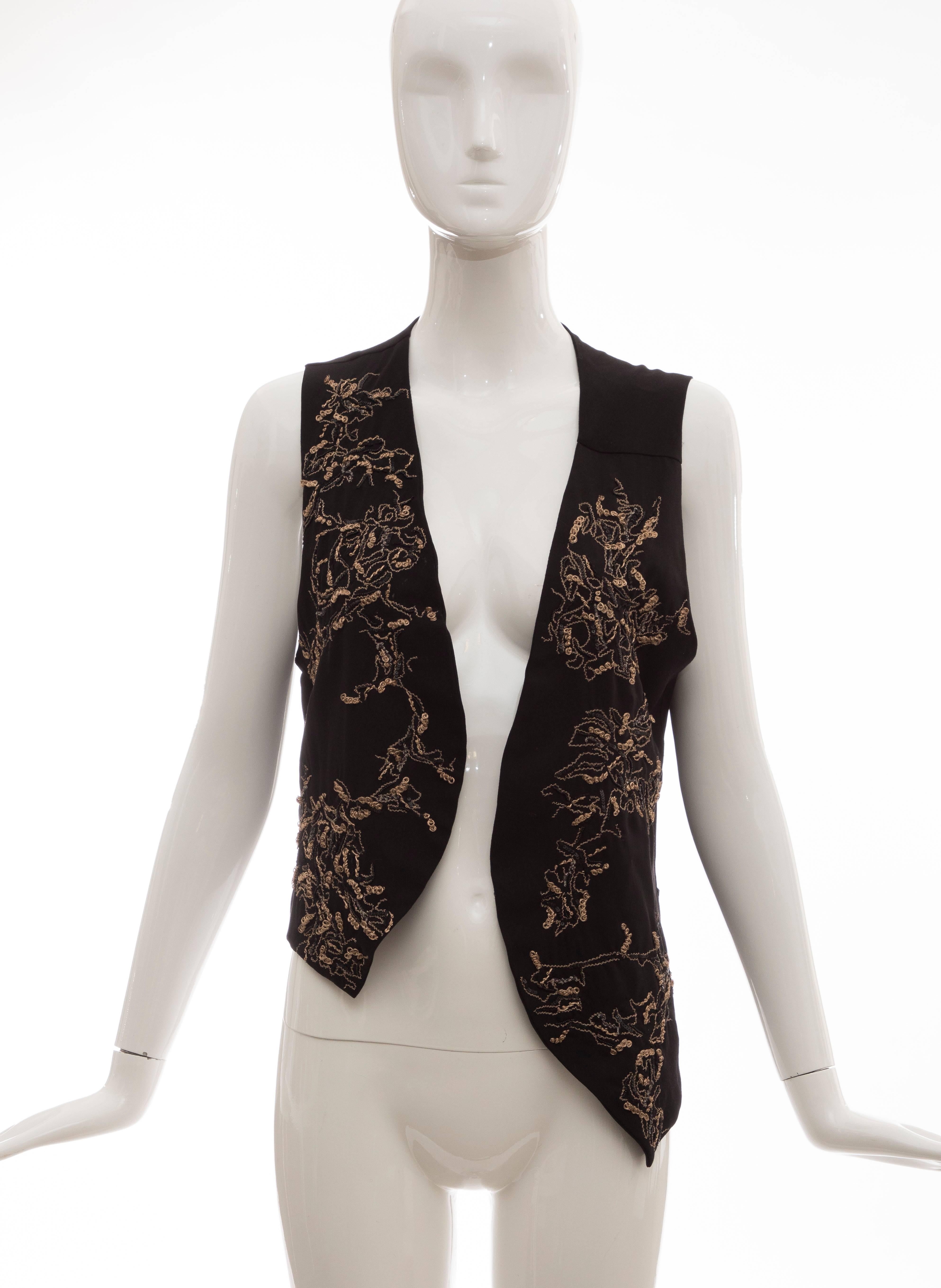 Ann Demeulemeester black embroidered assymetrical wool vest.

No Size Label

Bust 36, Waist 35, Length 24 