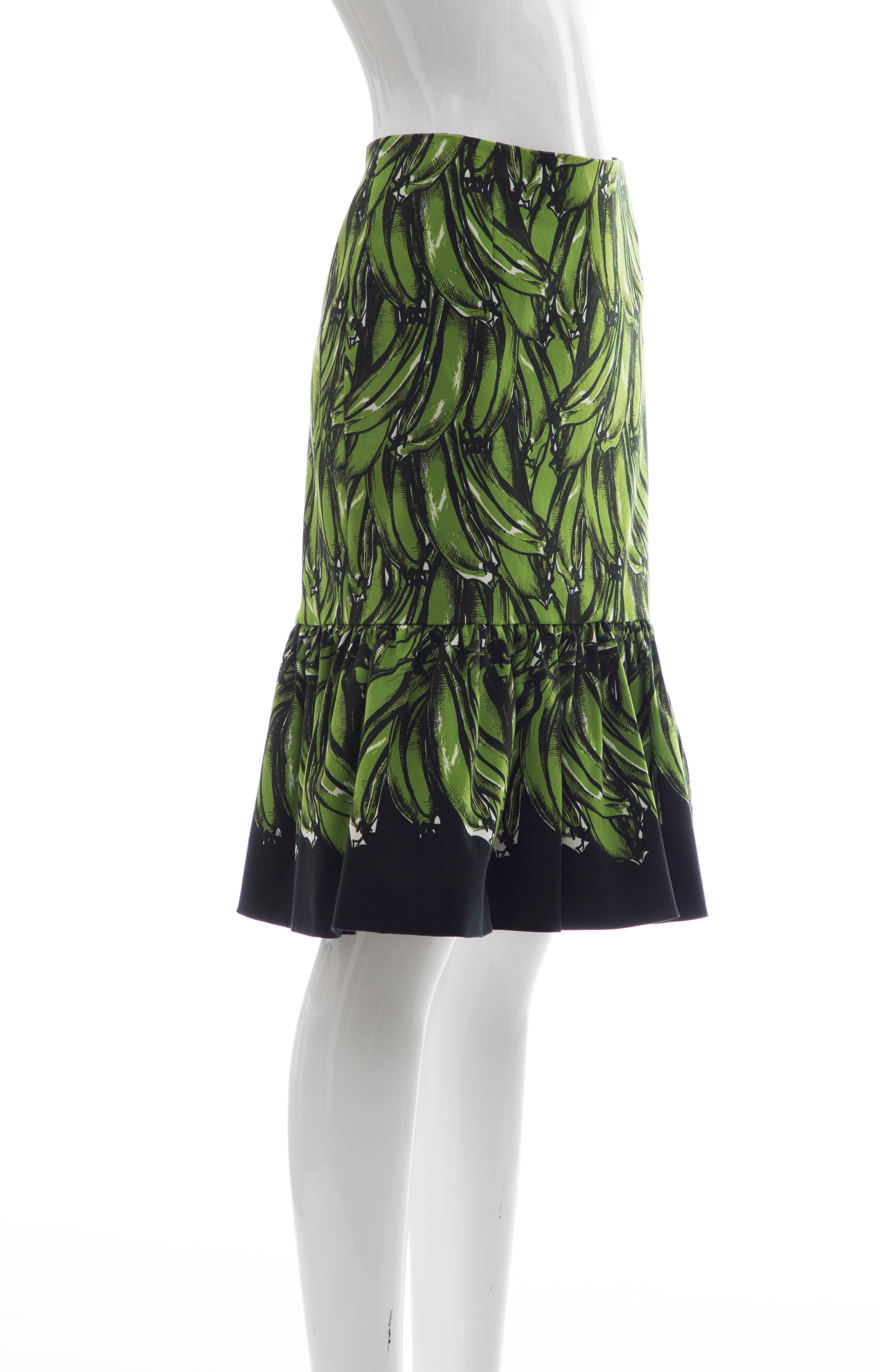 Prada, Spring-Summer 2011 black cotton with green plantains print skirt with flared hem and invisible zip closure at side seam

IT. 42, US. 6

Waist 26, Hips 17, Length 24