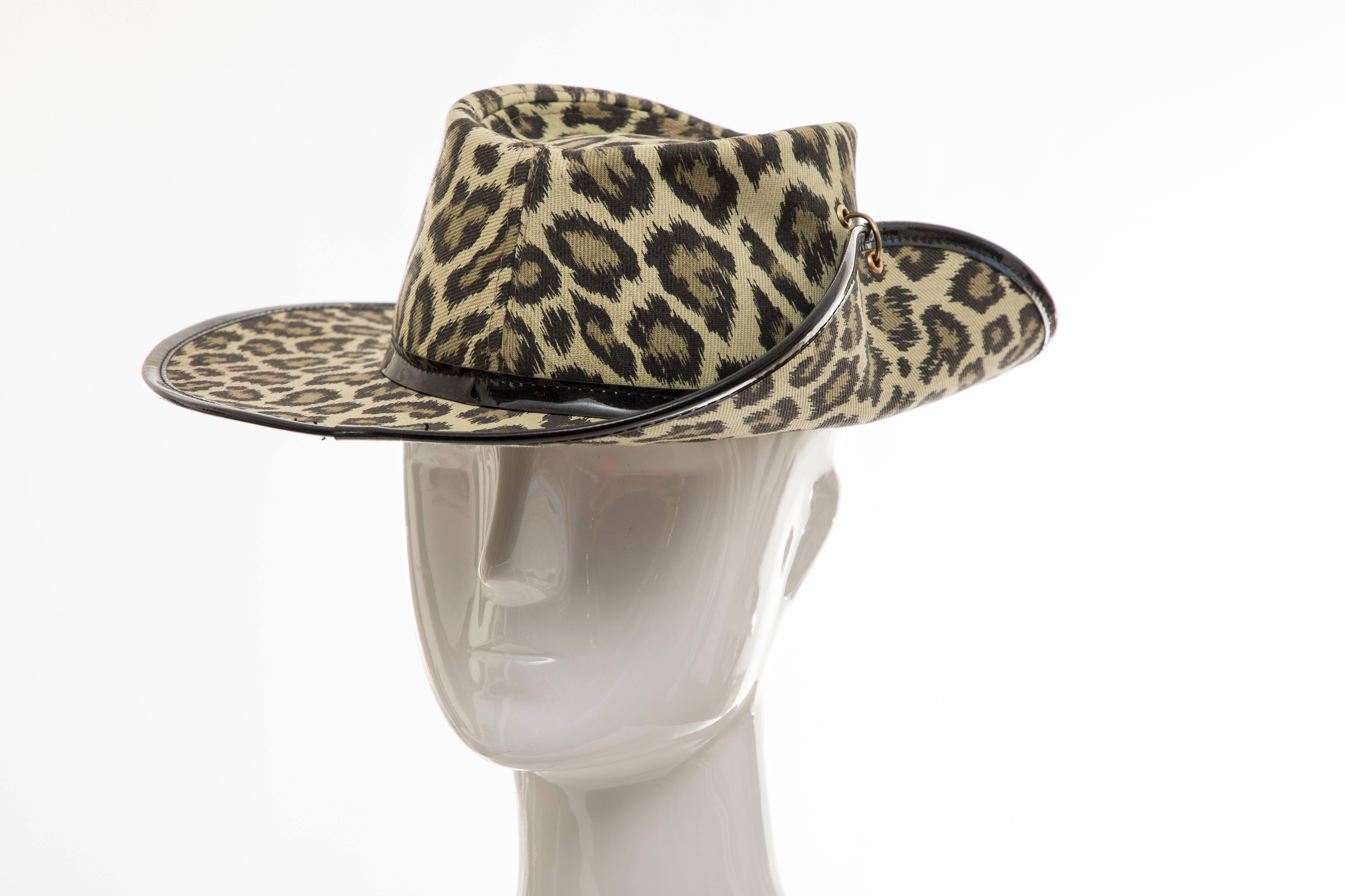 Junior Gaultier, Circa 1989 cotton leopard print hat with patent leather trim.

Circumference: 23