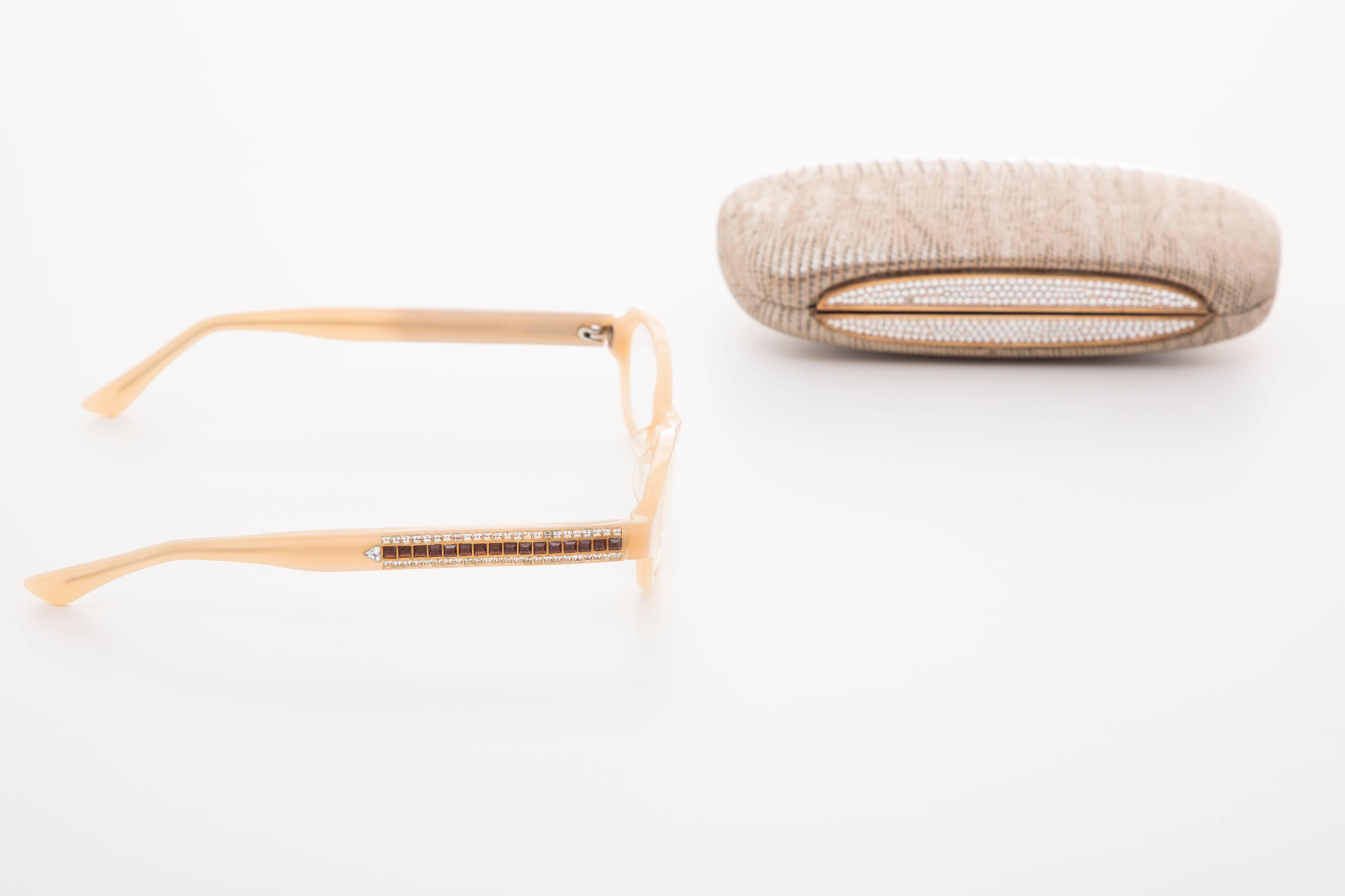 Judith Leiber readers reading glasses with crystal sides and crystal case. They have prescription lenses.