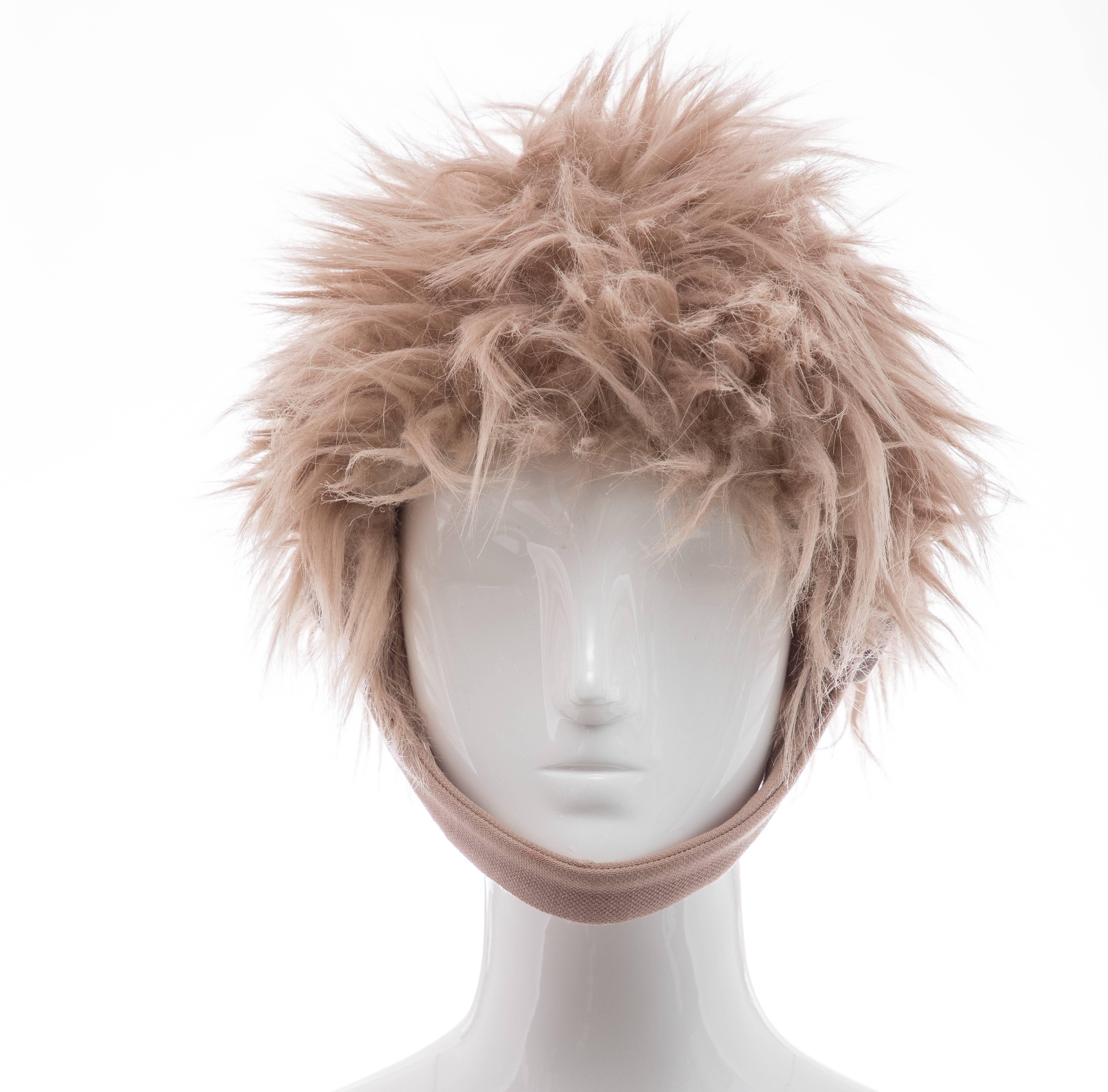  Prada, Fall 2011 faux fur hat with tonal button closures at sides. 

Circumference: 20, 
