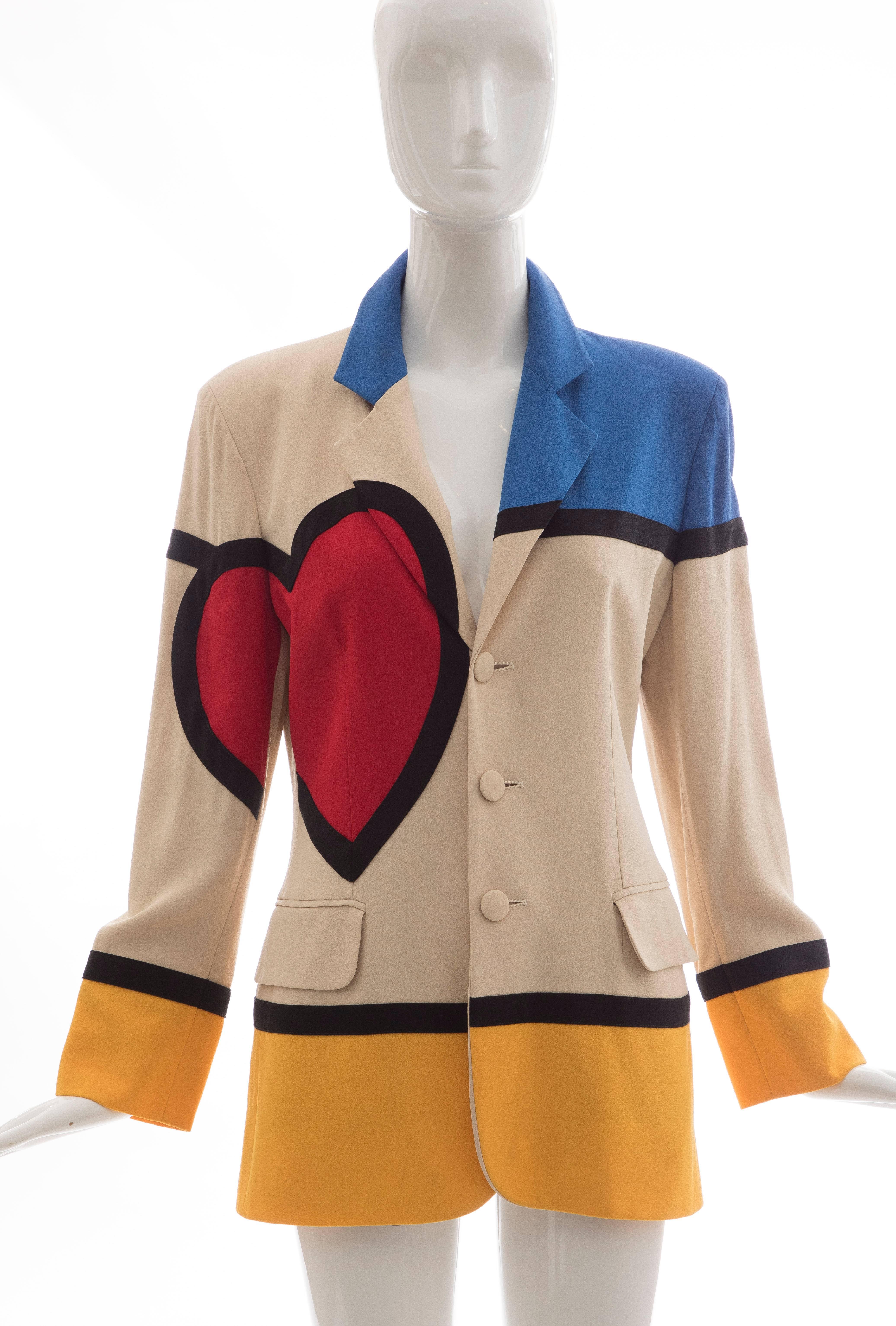 Moschino Cheap and Chic, Circa 1990's colorblock blazer with notched lapels, structured shoulders, long sleeves, Mondrian Heart at side, 'Art is Love' text at back, dual flap pockets and button closures at front.

IT. 42, US. 6

Bust: 39, Waist: 34,