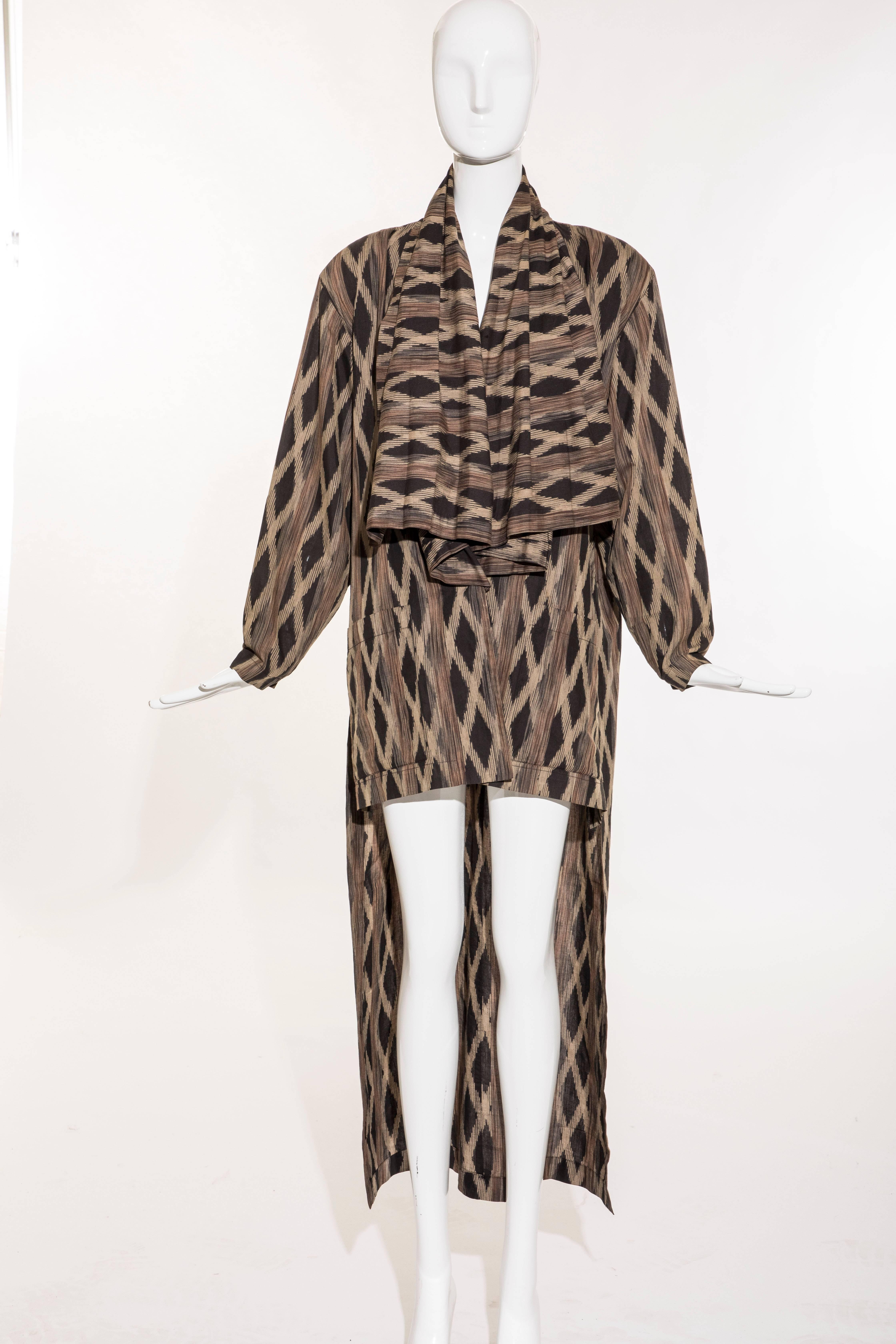 Issey Miyake, Fall 1986 cotton, silk, button front lattice weave  jacket and duster cardigan combination with shawl collar, long sleeves, large patch pocket, shoulder pads, interior buttons to each side and the back to make the back panel into a