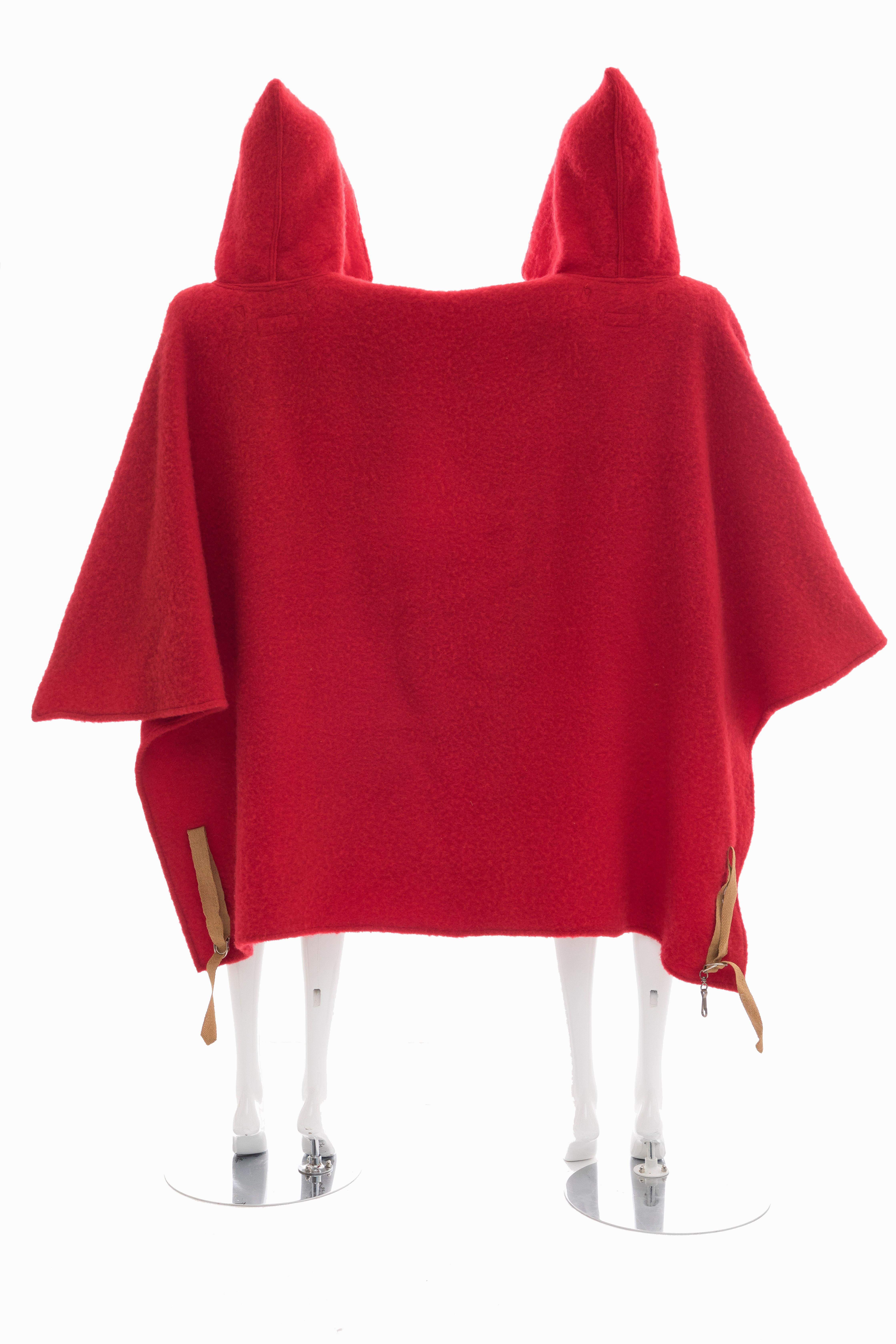  Jean Charles de Castelbajac, circa: 1970's  two-person wool poncho with dual oversize canvas pockets at front, contrast-trimmed arm slit at center and dual hoods featuring button closures at necklines.

One Size
Length: 46