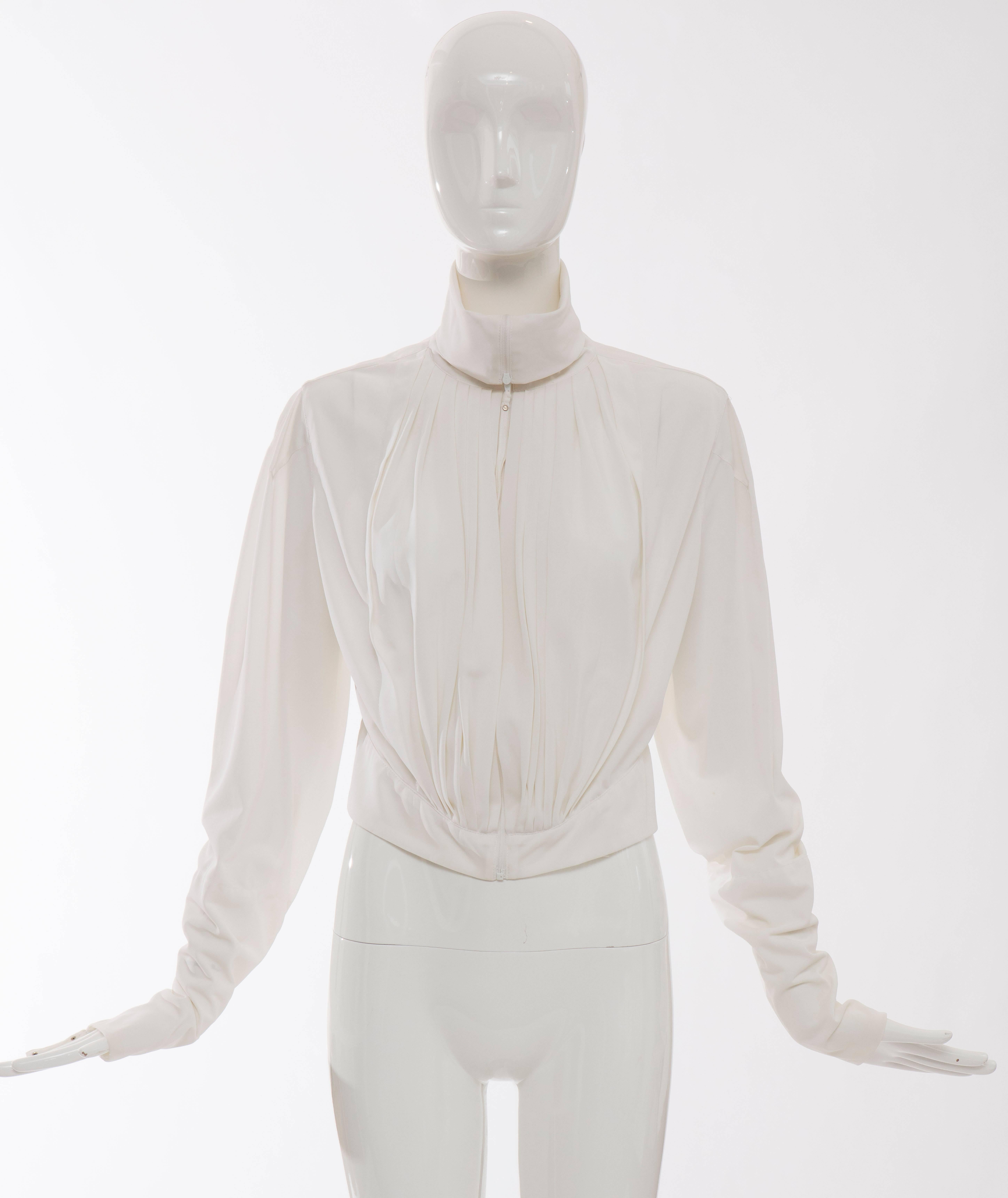 Jean Paul Gaultier, Circa 1990's white nylon, zip front pleated jacket with zip sleeves.

No Size Label

Bust 38, Waist 32, Sleeve 28, Length 18

