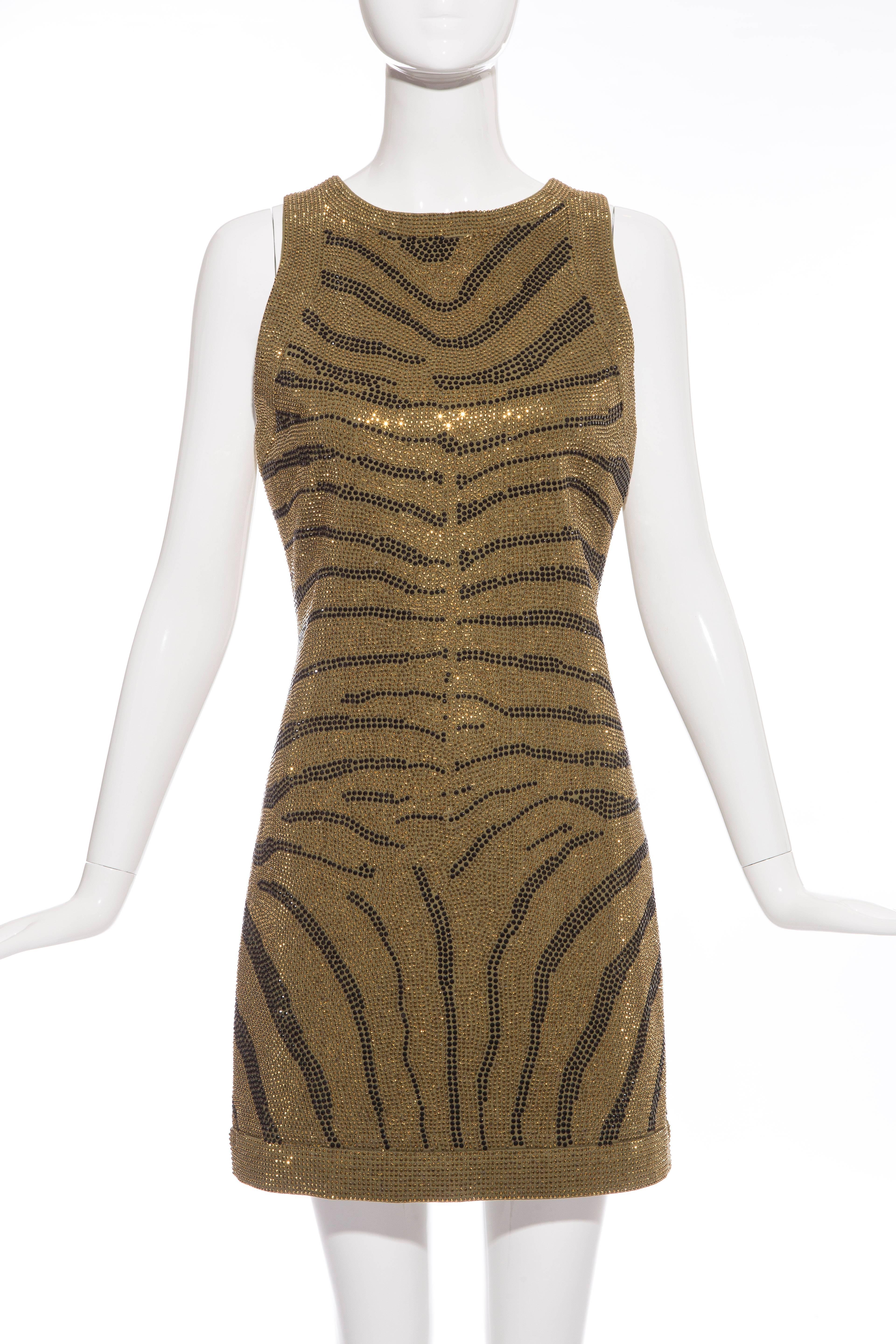 Balmain Pre-Fall 2014, olive green sleeveless dress with gold and black zebra print crystals throughout and exposed back zip closure.

EU. 38, US  6

Bust 32