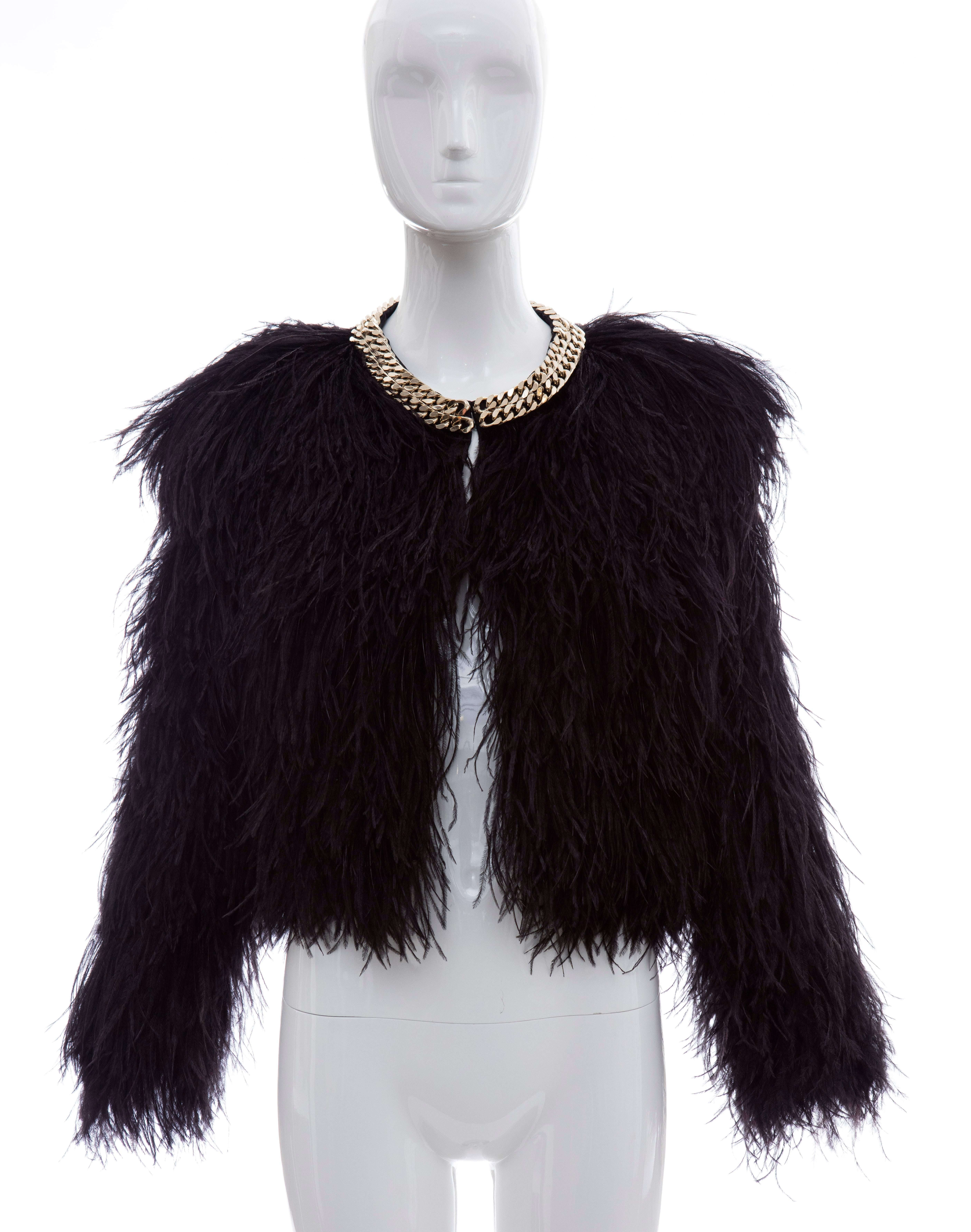 Givenchy black ostrich feather jacket with gold-tone chain trim collar. open front and fully lined in silk.

Bust 36”, Waist 36”, Shoulder 17”,  Length 17”

EU. size 38

US. size 6