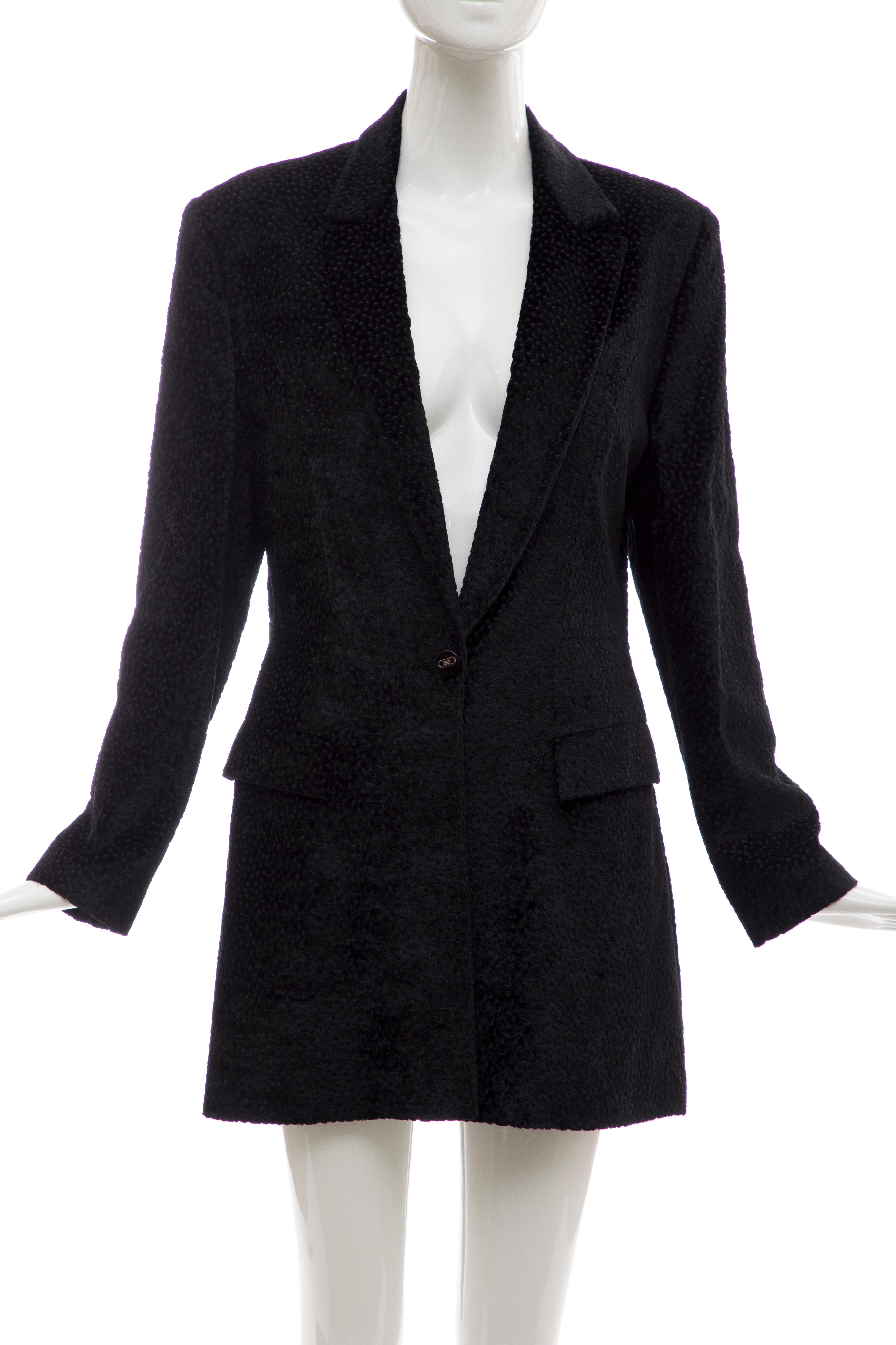 Salvatore Ferragamo, Circa: 1990's black flecked velvet  jacket, front button closure, two front pockets and fully lined.  

IT. 44
US. 8

Bust: 36, Waist 32, Hip: 38, Length: 34, Shoulder: 18, Sleeve: 23.5
