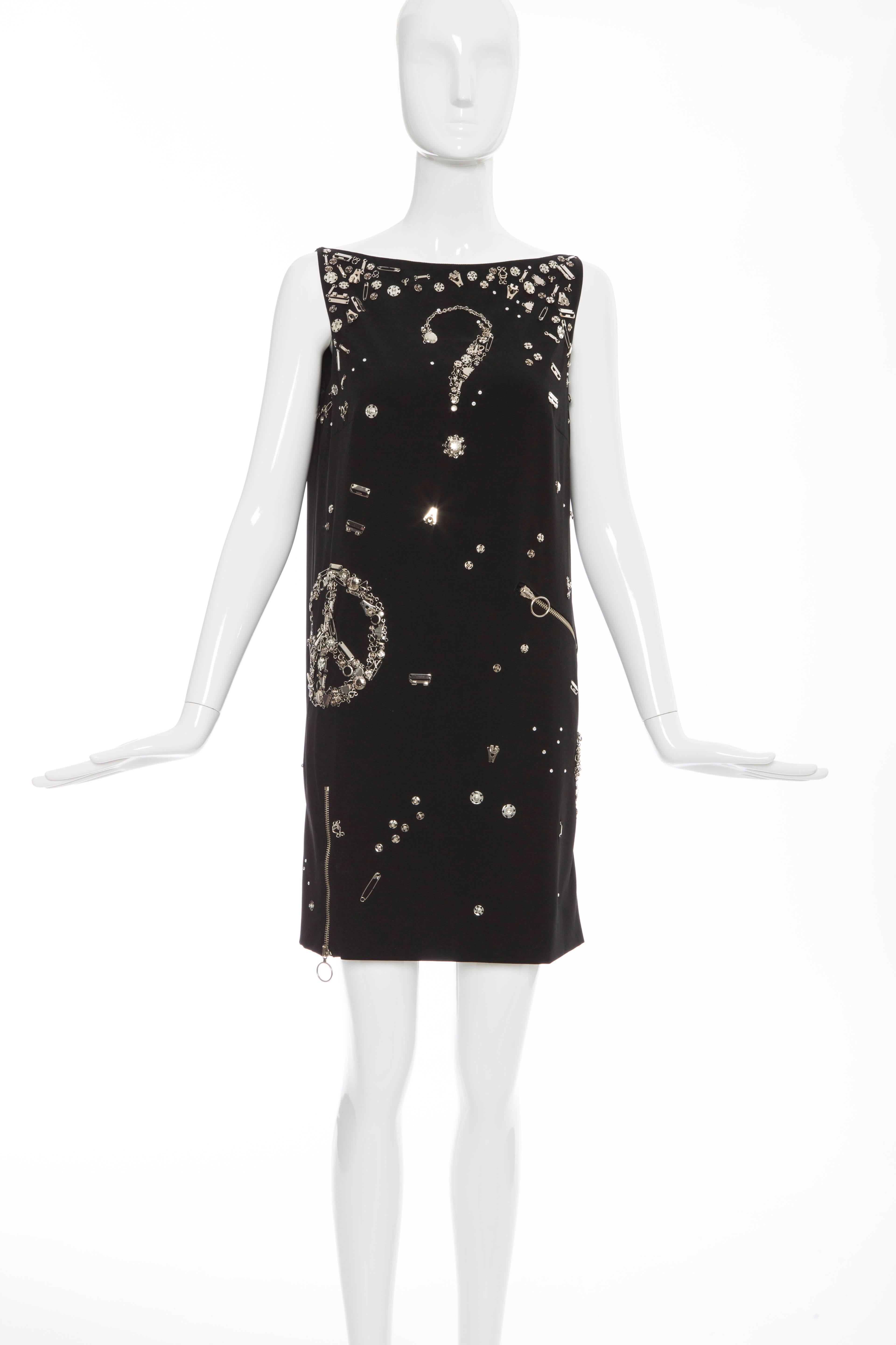 Moschino Couture, Fall 2009 black sleeveless safety pin embellished dress back zip and fully lined in silk.

US: 8, IT: 42, GB: 10

Bust: 35, Waist: 34, Hips 36, Length 32