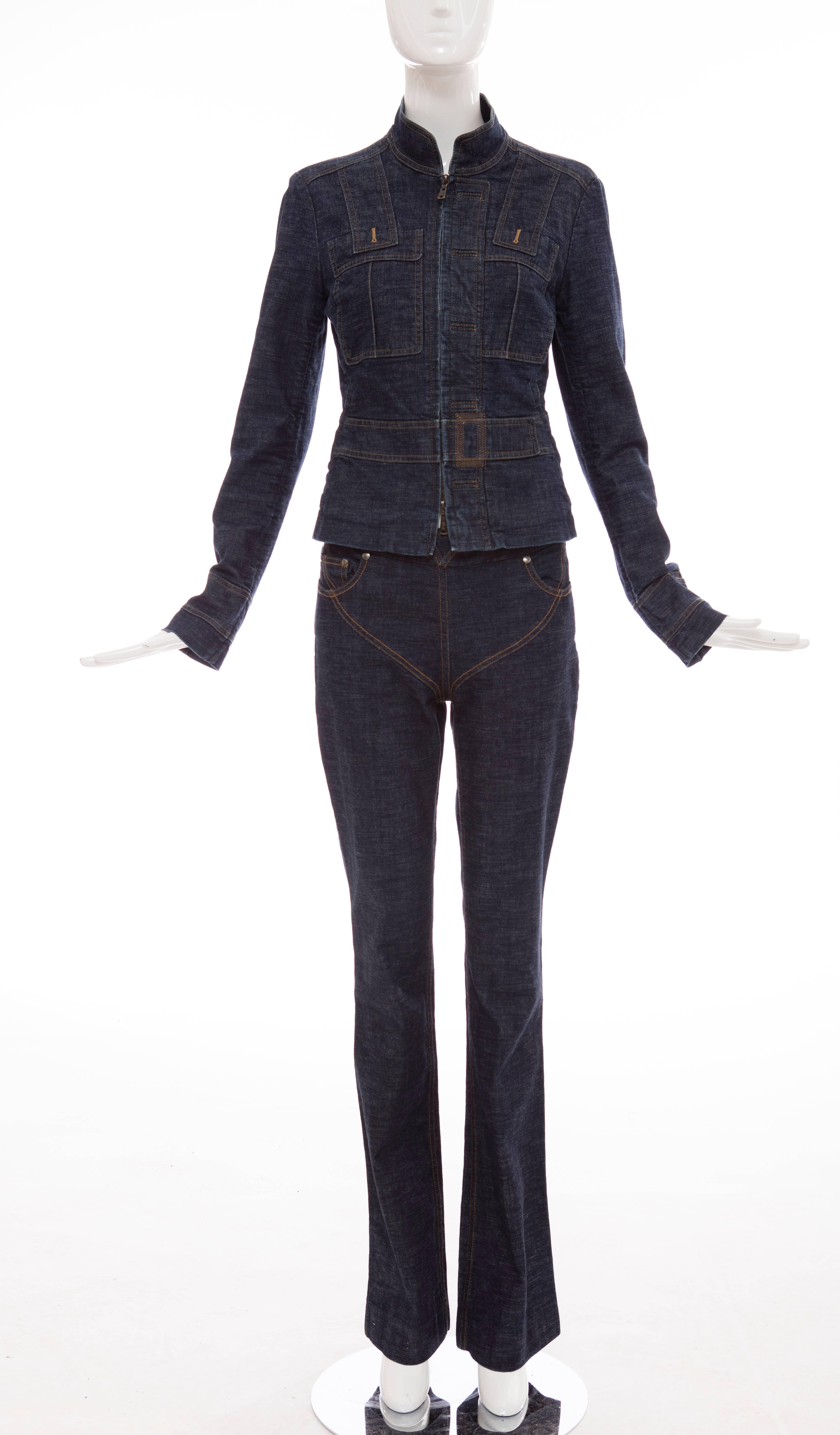  Yves Saint Laurent Rive Gauche, Circa 2003, denim pantsuit. Jacket features contrast stitching throughout with concealed zip closure at center front. Pants feature two front pockets, two back pockets, contrast stitching with heart design at center