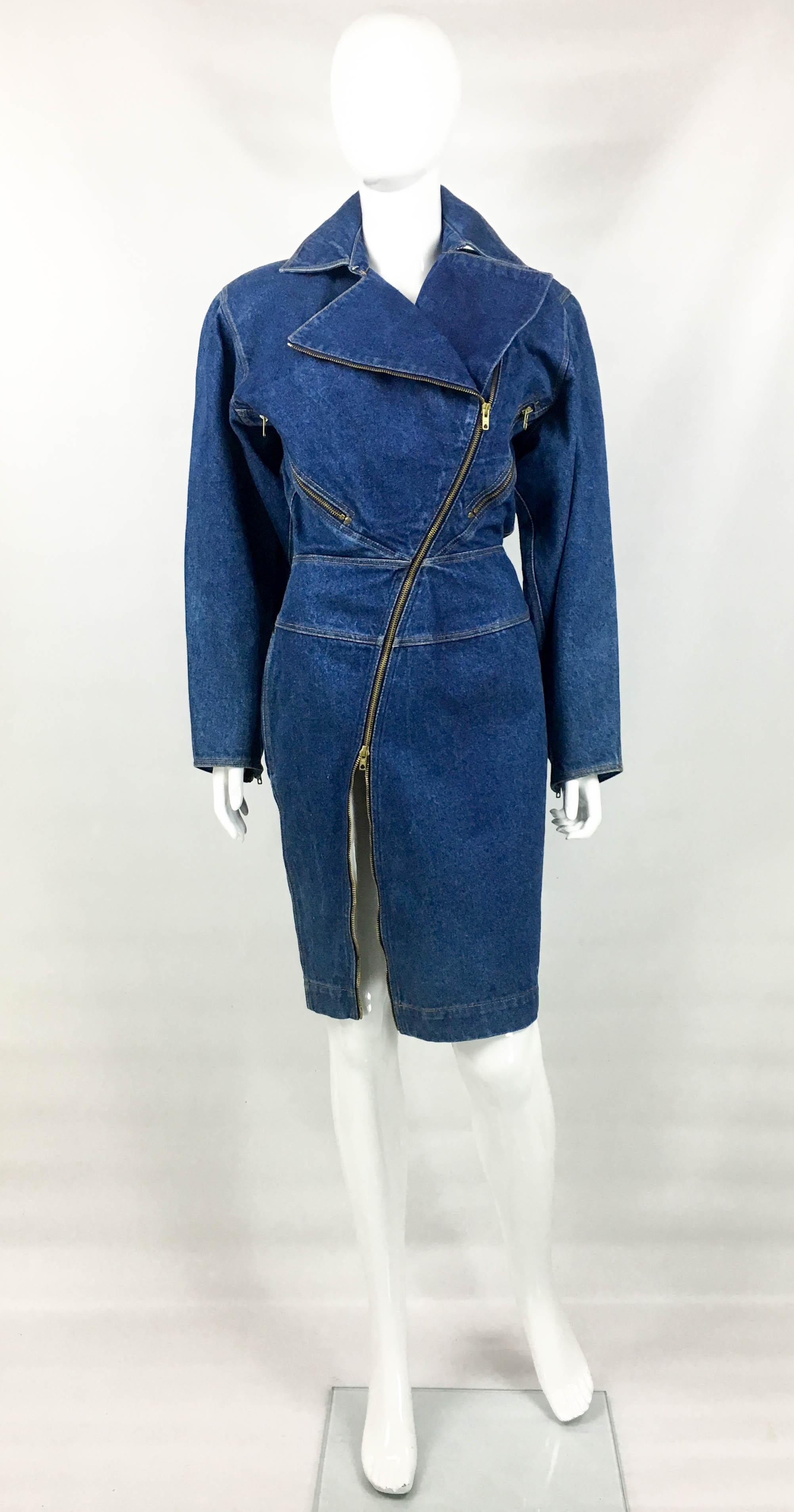 Vintage Azzedine Alaia Denim Motorcycle Zipper Dress. This striking piece by Azzedine Alaia was crafted for the 1985 Autumn / Winter Collection. A similar dress was photographed by Arthur Elgort for Vogue, February 1986 (please refer to photos). In