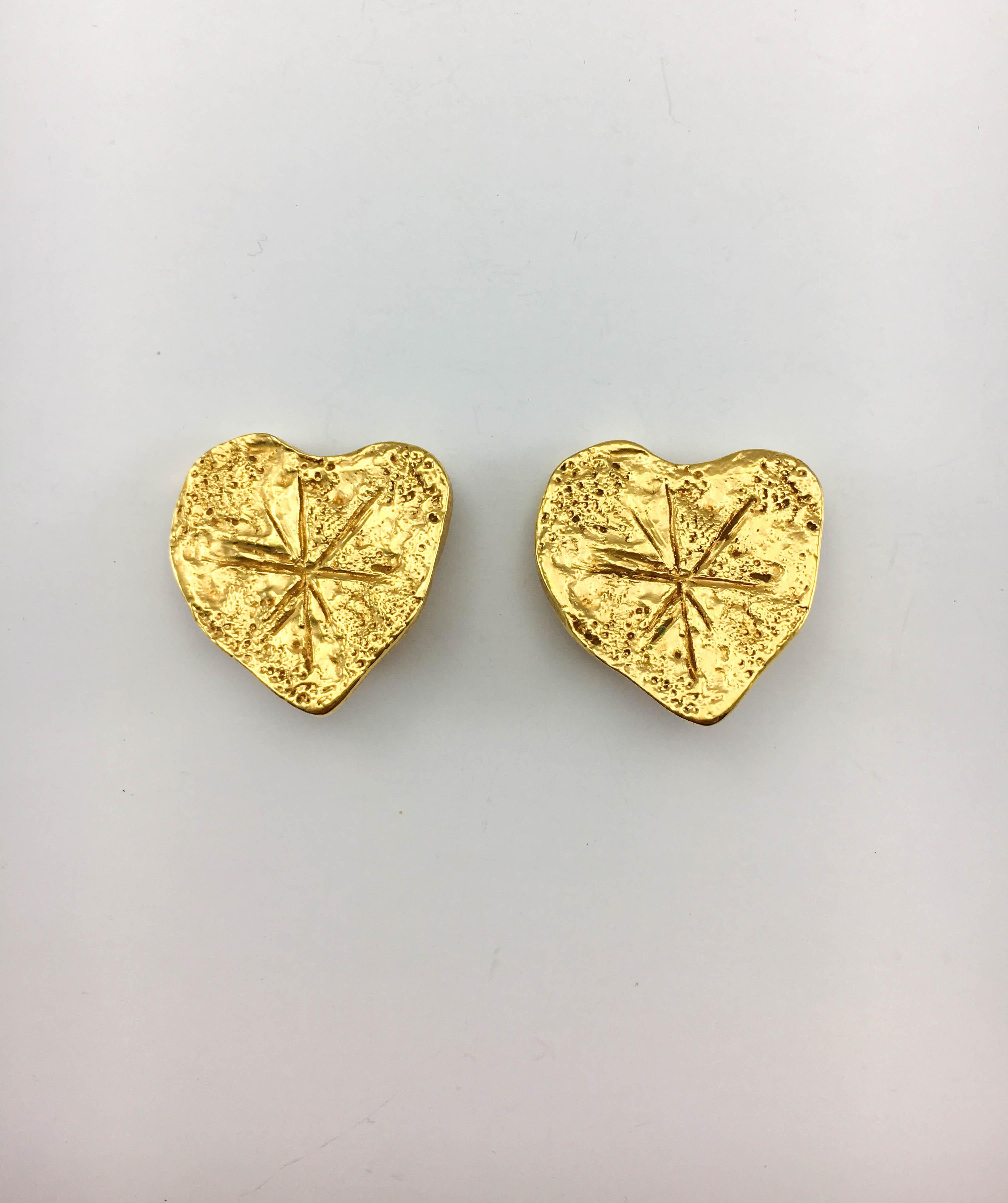 Vintage Christian Lacroix Gold-Plated Texturized Heart Clip-On Earrings. These striking earrings by Christian Lacroix by Goossens were created in 1994. Heart-shaped and crafted in gold-plated metal, the pieces are texturized, giving them an organic,