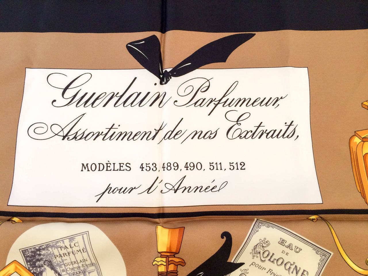 Guerlain Parfumeur, Assortiment de nos Extraits, Modeles 453, 489, 490, 511, 512, pour l’Anneel - beautiful silk scarf. This was probably a limited edition from the early 1990s in celebration of their perfumes. Hand-rolled hems. 

Period: