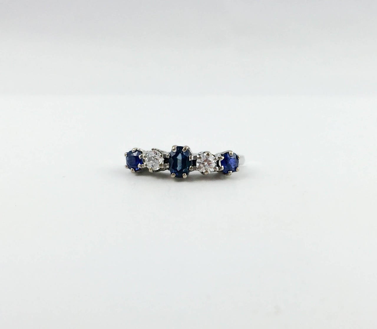Stylish Vintage Platinum, Sapphire and Diamond Ring. This 5 stone ring features 2 diamonds and 3 sapphires on platinum. Great design and beautiful piece of jewellery.

 

Period: 1930s

Origin: England

Materials: Platinum, Diamonds and