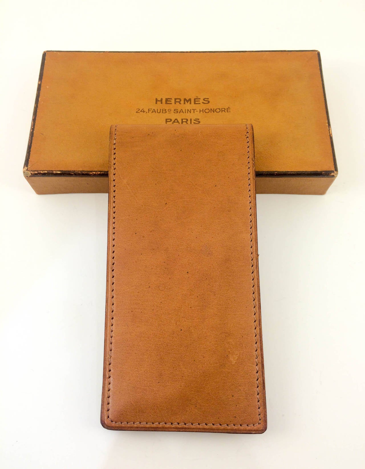 Fabulous Vintage Hermes Notepad. This amazing piece from the 1950s comprises of a leather case and 6 notepads in its original box. It seems to have never been used, with the only signs showing being due to age. The box has a bit of wear and tear on