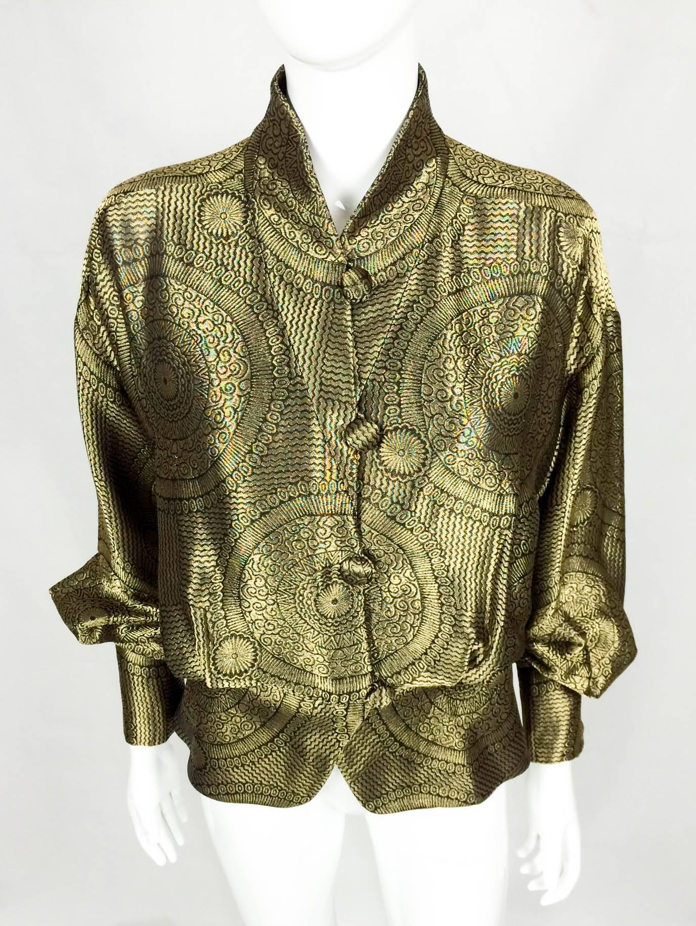 One of a kind Lanvin Silk and Lurex Jacket. This gorgeous 1930s-inspired piece from the late 1980s features a beautiful and elaborate interwoven pattern. Made in silk and lurex, this jacket has four covered buttons down the front and one on each