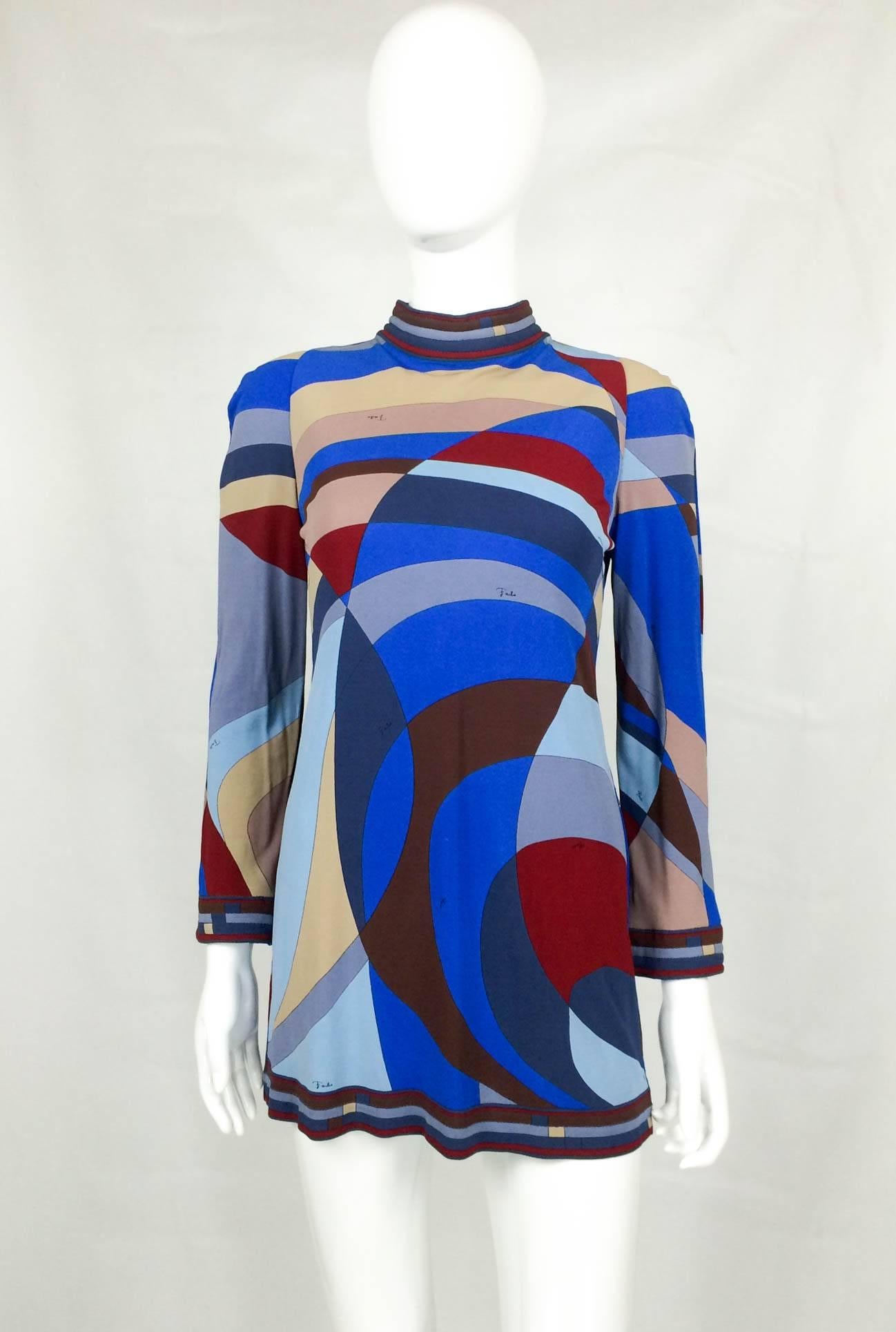 Dashing Pucci Mini Dress. This sexy Emilio Pucci mini-dress can also be worn over trousers. It features a great geometric, Op Art pattern in a mixture of bold and light colours. It has a mod, 1960s A-line silhouette. The iconic Emilio Pucci