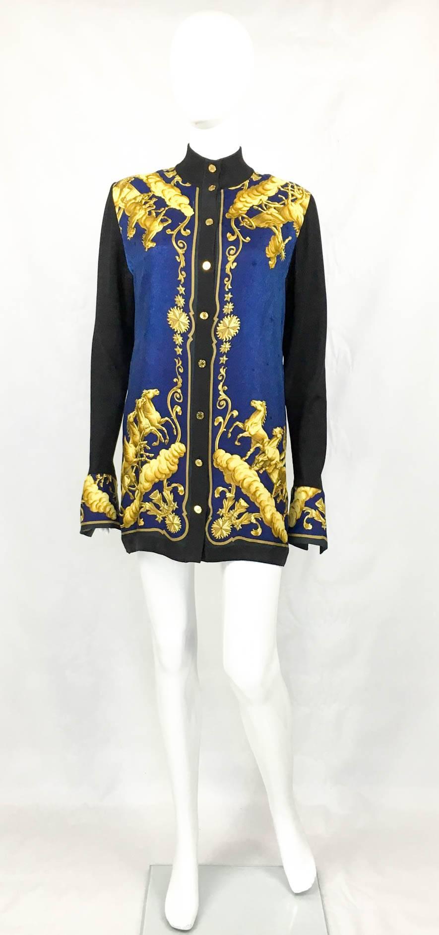 Stunning Vintage Hermes Silk Shirt Jacket. This beautiful piece by Hermes can be worn as a shirt or a jacket, as well as a mini-dress. The Cosmo design by Philippe Ledoux has a mythological motif and it was originally released as a scarf in 1966. In
