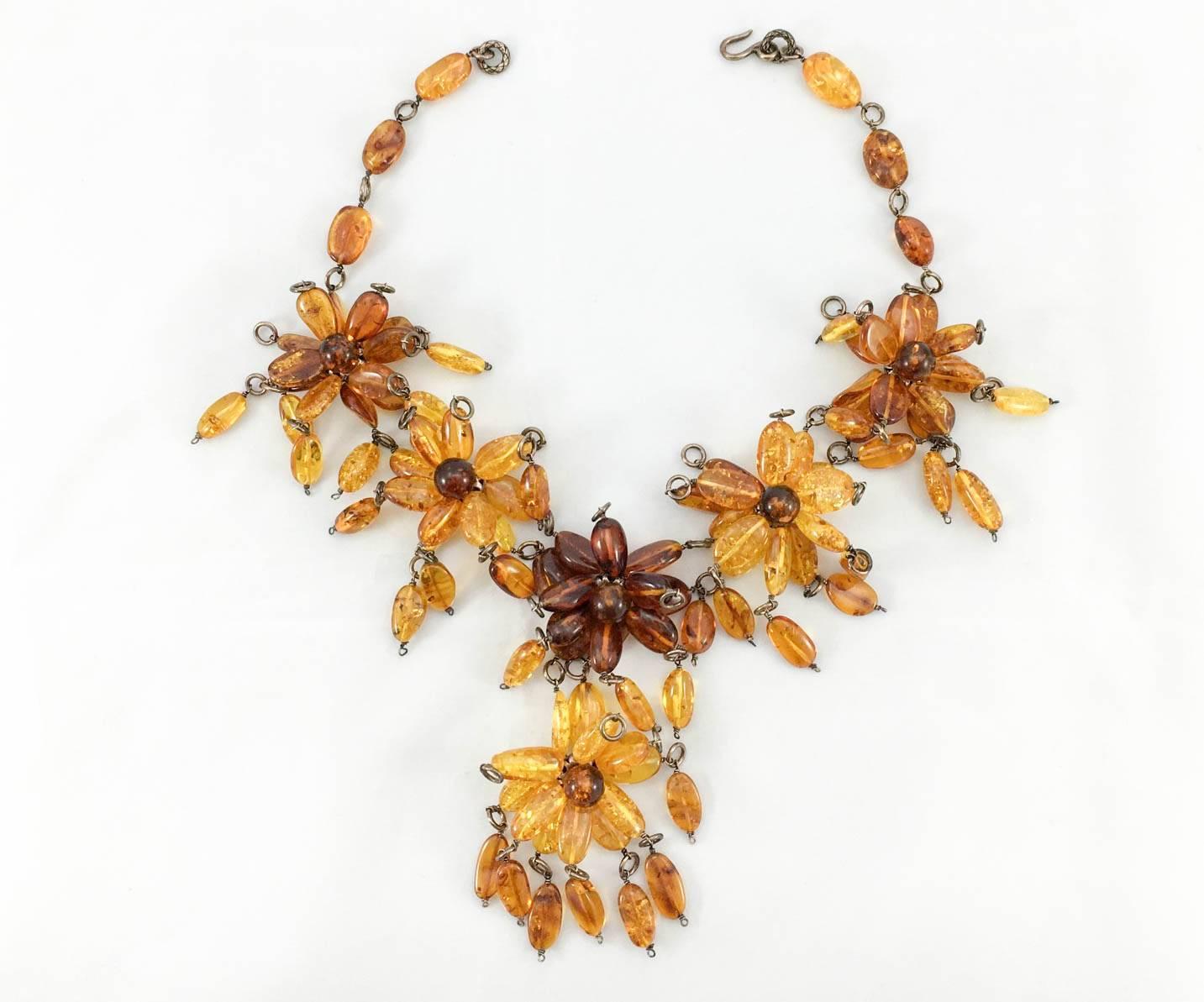 Fabulous Bottega Veneta Amber Flower Necklace. This one of kind piece by Bottega Veneta was part of two looks on the Spring/Summer 2009 runway show. Composed of six flowers made out of amber and sterling silver, the same design was worn by Ginnifer