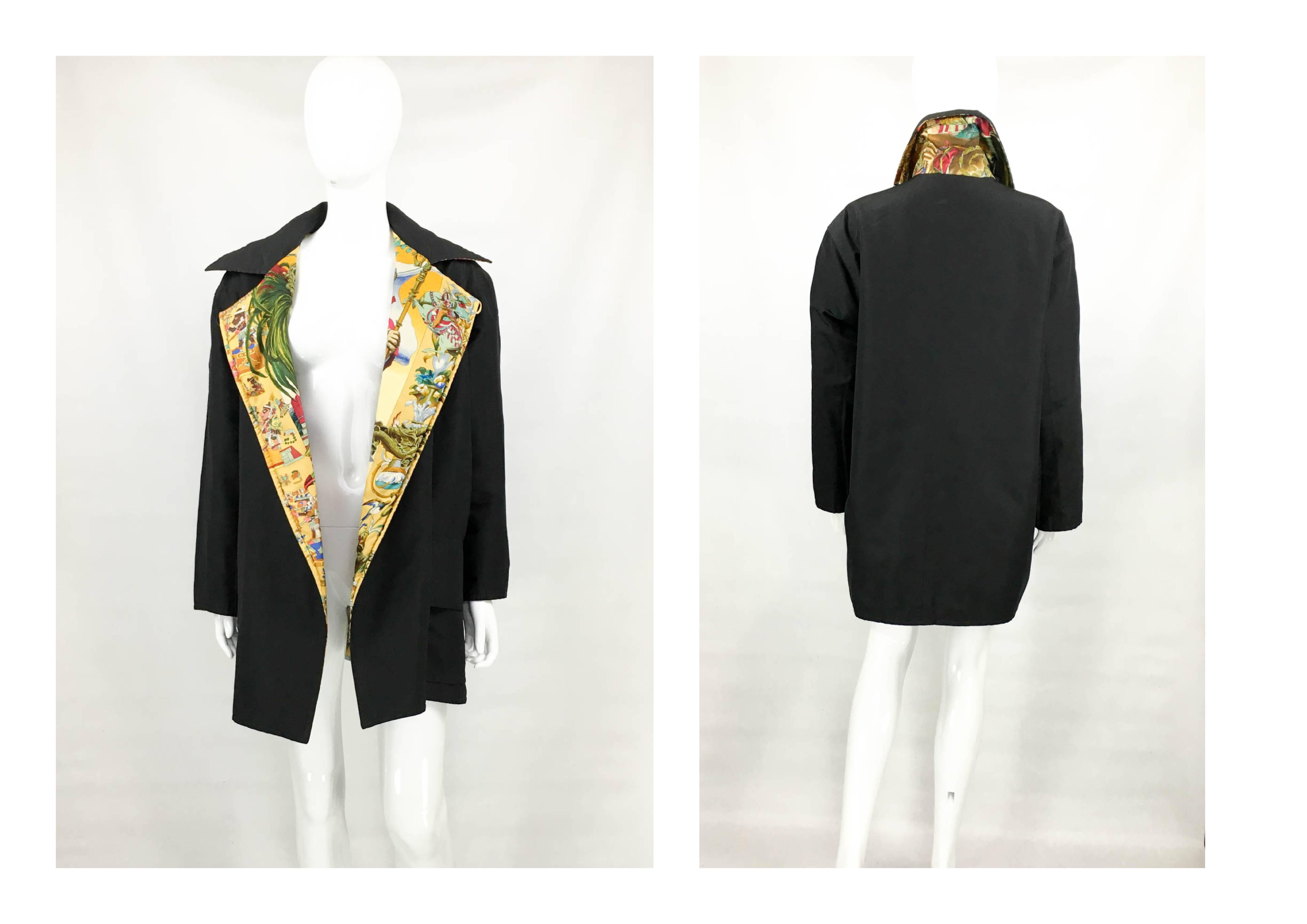 Vintage Hermes Reversible Puffer Jacket. This absolutely
stunning Hermes reversible jacket is black on one side and features the Les
Ameriques print on the other. Designed by Kermit Oliver, this print was
released in 1994 in celebration of the