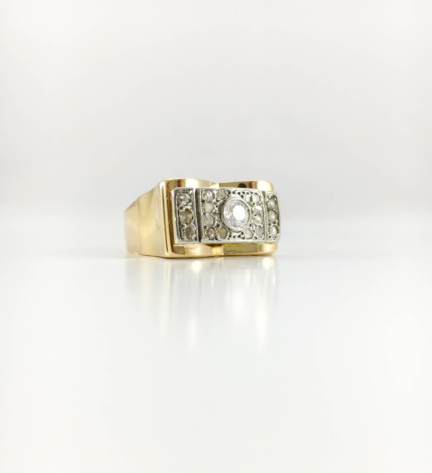 Amazing Vintage Gold and Diamond Cocktail Ring. This is a truly stunning example of the full-on glamour of the 1940s. Made in 18ct gold, this ring features a beautiful design created by diamonds. With 0.5 a carat, the diamond in the centre is