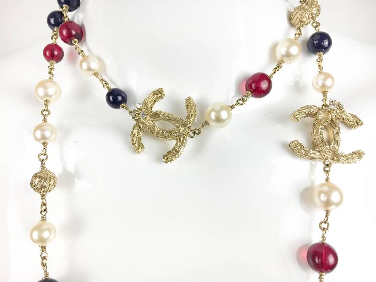 Chanel Long Faux Pearl and Glass Bead Logo Necklace - 2014 at 1stDibs