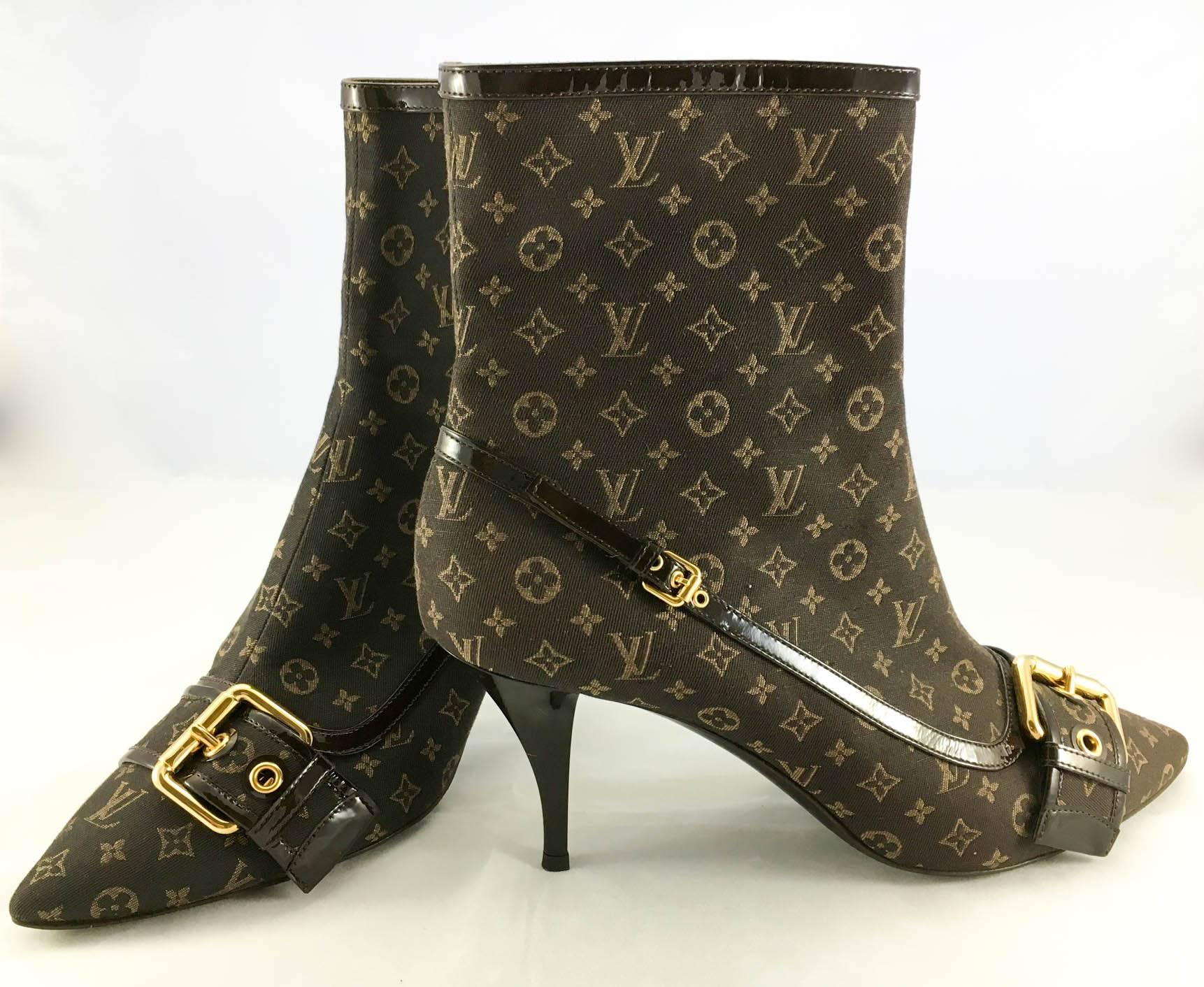 Fabulous Louis Vuitton Mimosa Monogram Mini Ankle Boots. These gorgeous 3-inch heel boots by Louis Vuitton are at once luxurious and bold. They boast the shape of a pump with the volume of boots. They are made in brown canvas featuring the iconic
