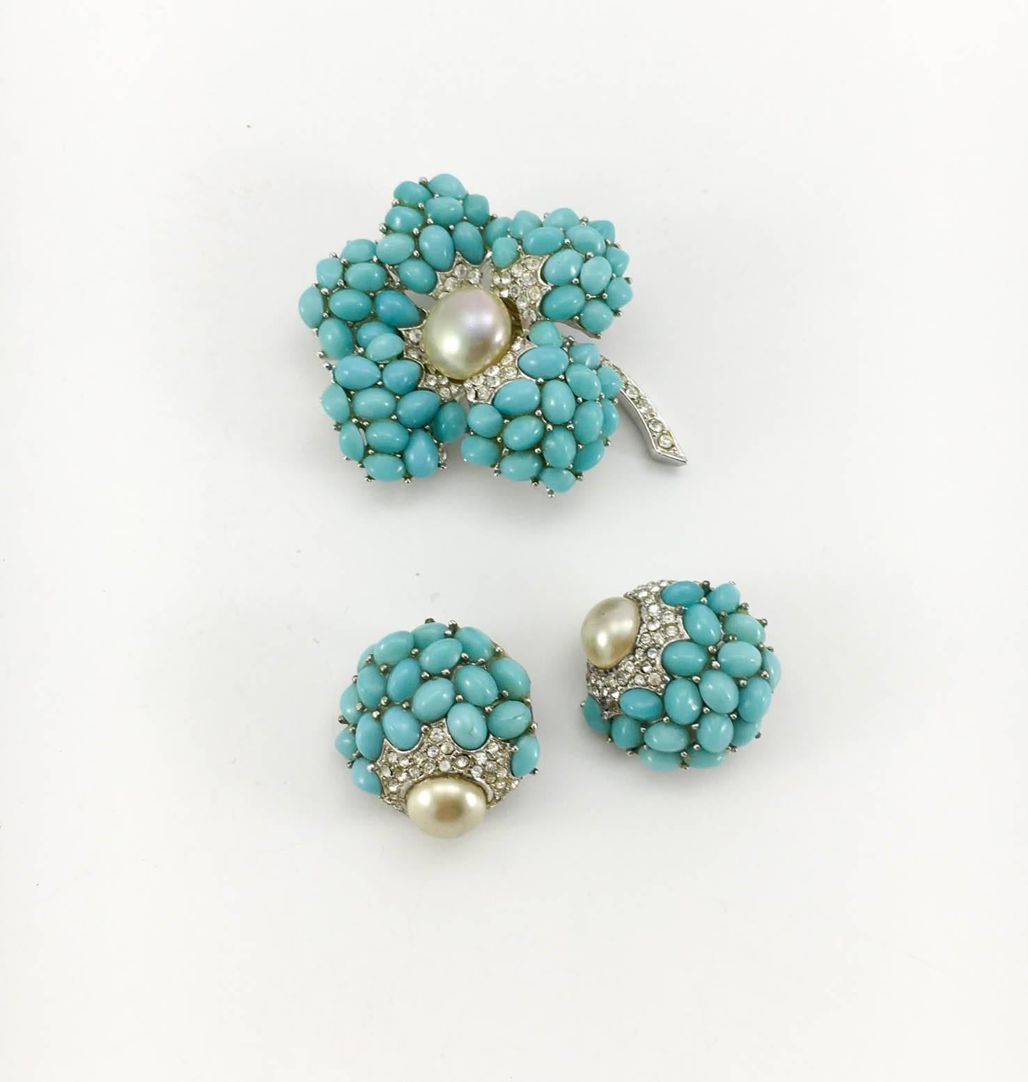 Vintage Boucher Earrings and Brooch Set. This beautiful set by Boucher comprises of a flower brooch and a pair of earrings. The faux turquoise beads are combined with paste (rhinestones), glass pearls and white metal. Marcel Boucher was a jewellery