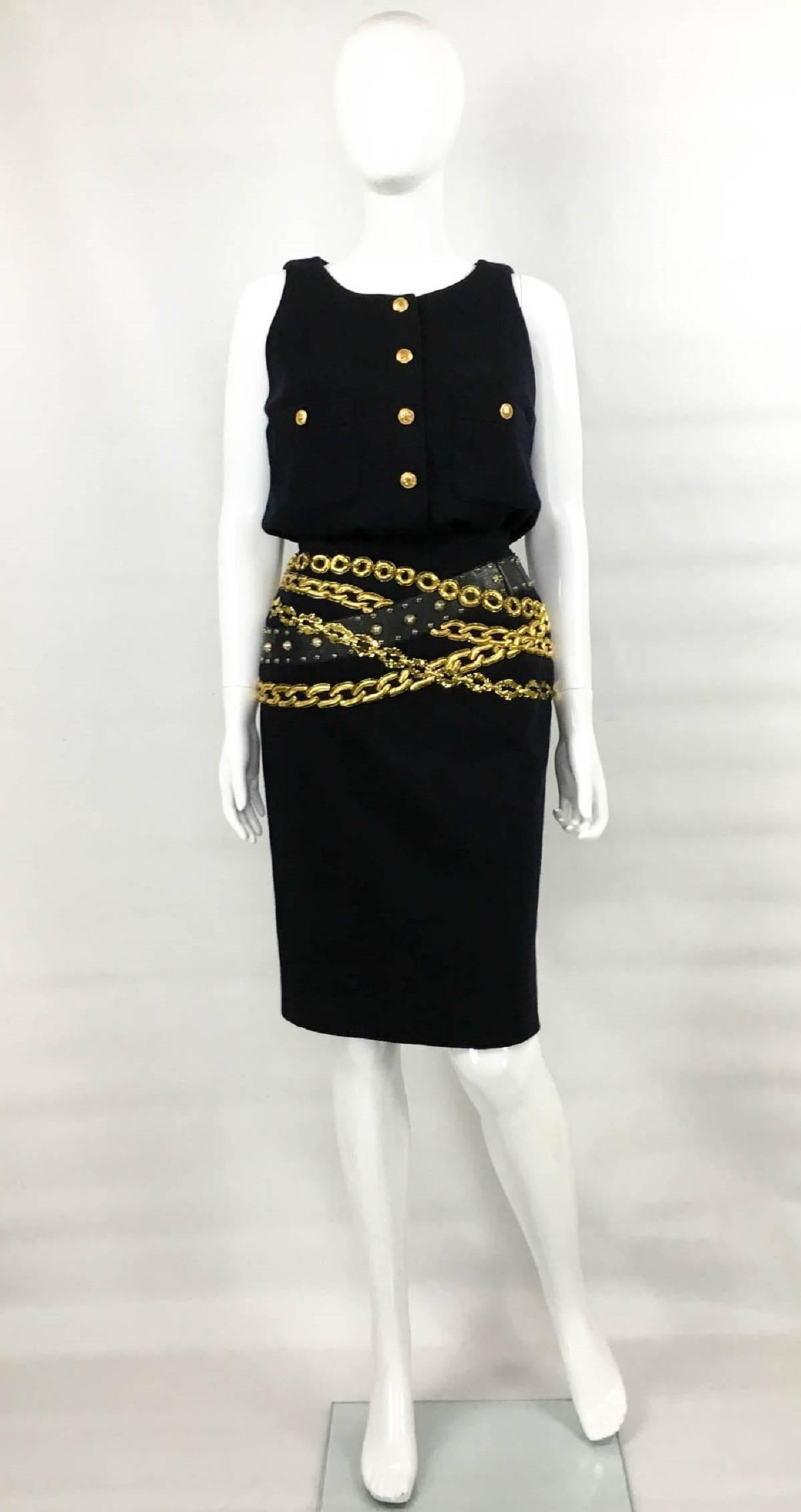 Amazing Vintage Chanel Chain Wool Black Dress. This fabulous dress was designed by Karl Lagerfeld for the 1985 Winter Collection. In this dress, Lagerfeld reworked Coco Chanel’s signature and paid homage to her frequent usage of chains throughout