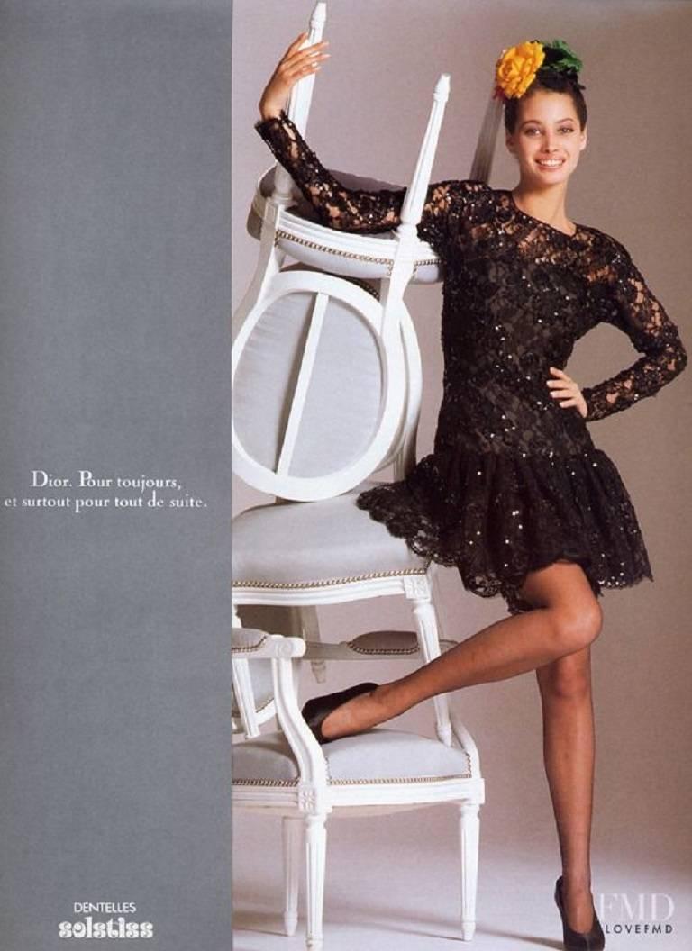 Amazing Vintage Dior Lace and Sequins Dress. This fabulous dress was worn by the iconic Christy Turlington in the Dior Fall Campaign in 1987. In gorgeous black lace, it features ornaments in black sequins, as well as black flowers constructed out of
