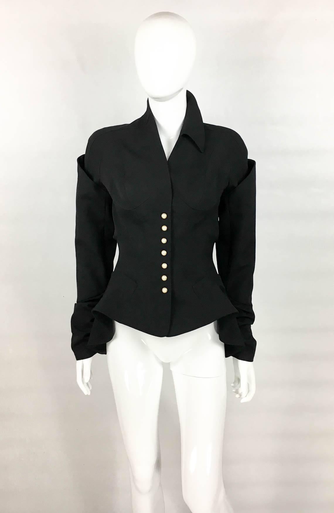 Important Vintage Thierry Mugler Wool Jacket (runway look). This absolutely fabulous architectural jacket by Mugler is made in wool gabardine and dates back from his iconic Fall/Winter 1995/1996 collection (see runway pics for identical piece). It