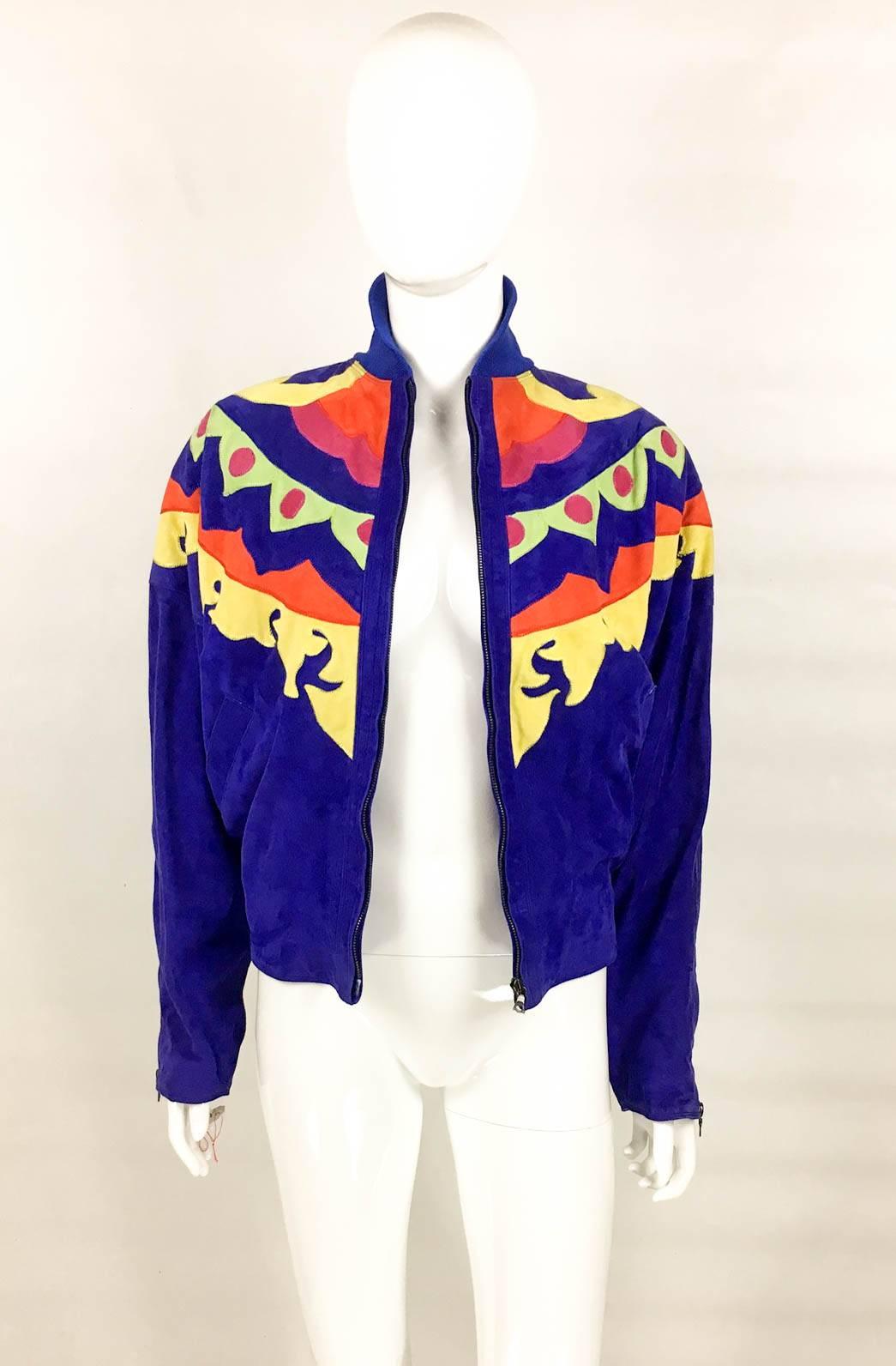 Vintage Gianni Versace Suede Jacket. This fabulous piece by Versace dates back from the 1990s. Made in suede, the main colour is a purply blue (in a white light is a rich blue, in a more yellow light it seems more purple) with suede appliques in