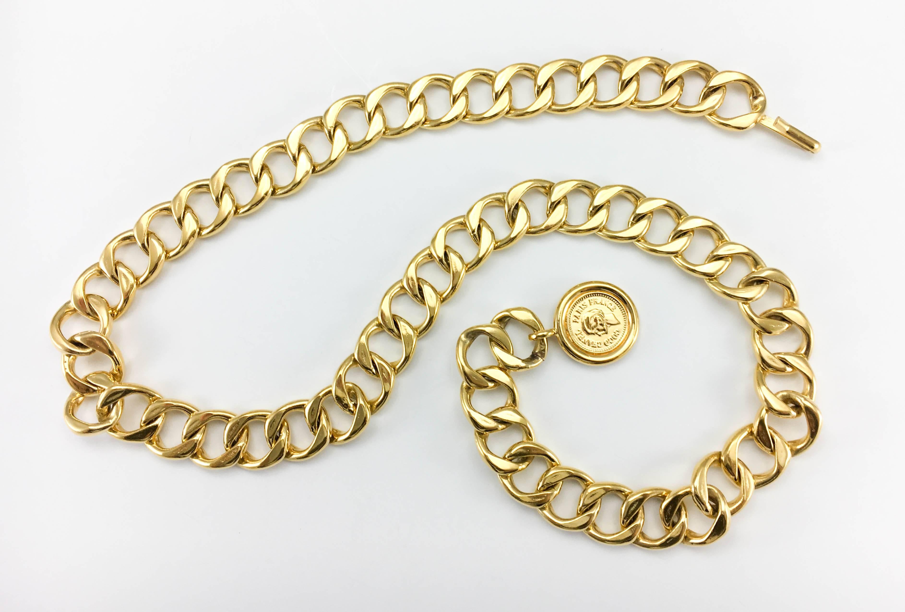 Beautiful Vintage Chanel Gold-Tone Medallion Chain Belt / Necklace. This fabulous piece by Chanel was created in the 1980’s. It is composed of a chunky chain and a medallion hanging at the end bearing the profile of Coco Chanel on one side and the