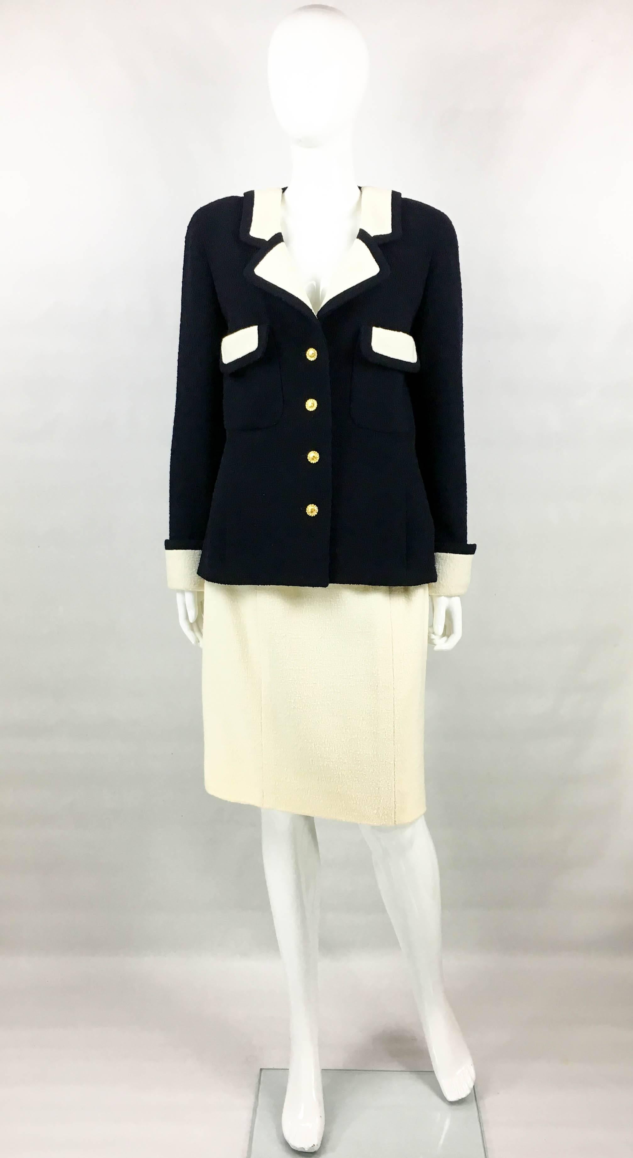 Stylish Vintage Chanel Nautical Inspired Wool Skirt Suit. From the early 1980’s, this beautiful suit by Chanel is made in wool, as well as being silk lined. In navy blue and white, it features Chanel signed gilt buttons with the iconic ‘CC’ logo and