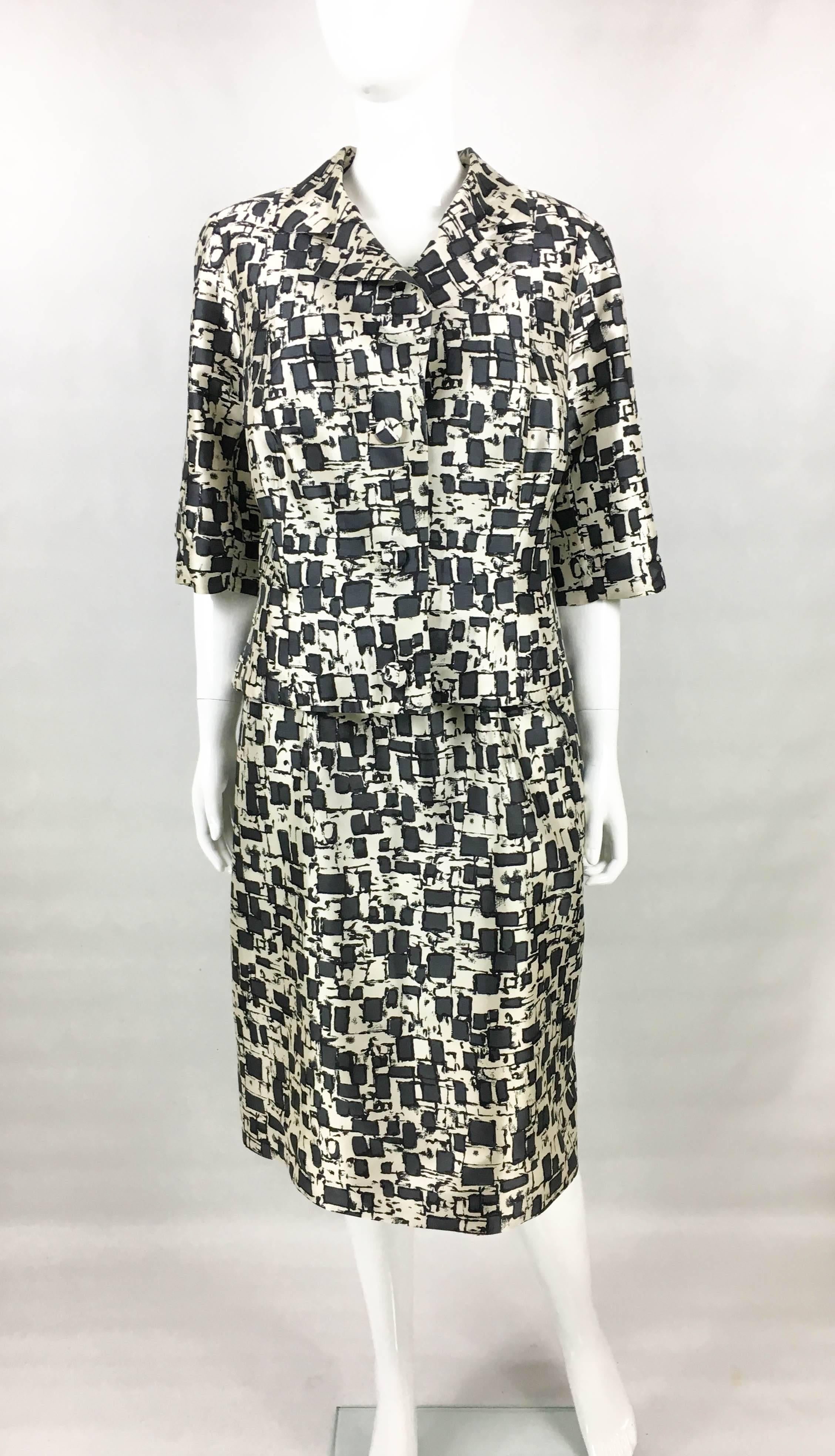 Chic Vintage Dior Couture Dress and Jacket Silk Ensemble. This very elegant ensemble was designed by Marc Bohan for the Christian Dior Haute Couture Spring/Summer 1968 – numbered 93035. In silk, the off-white background print bears a grey and black