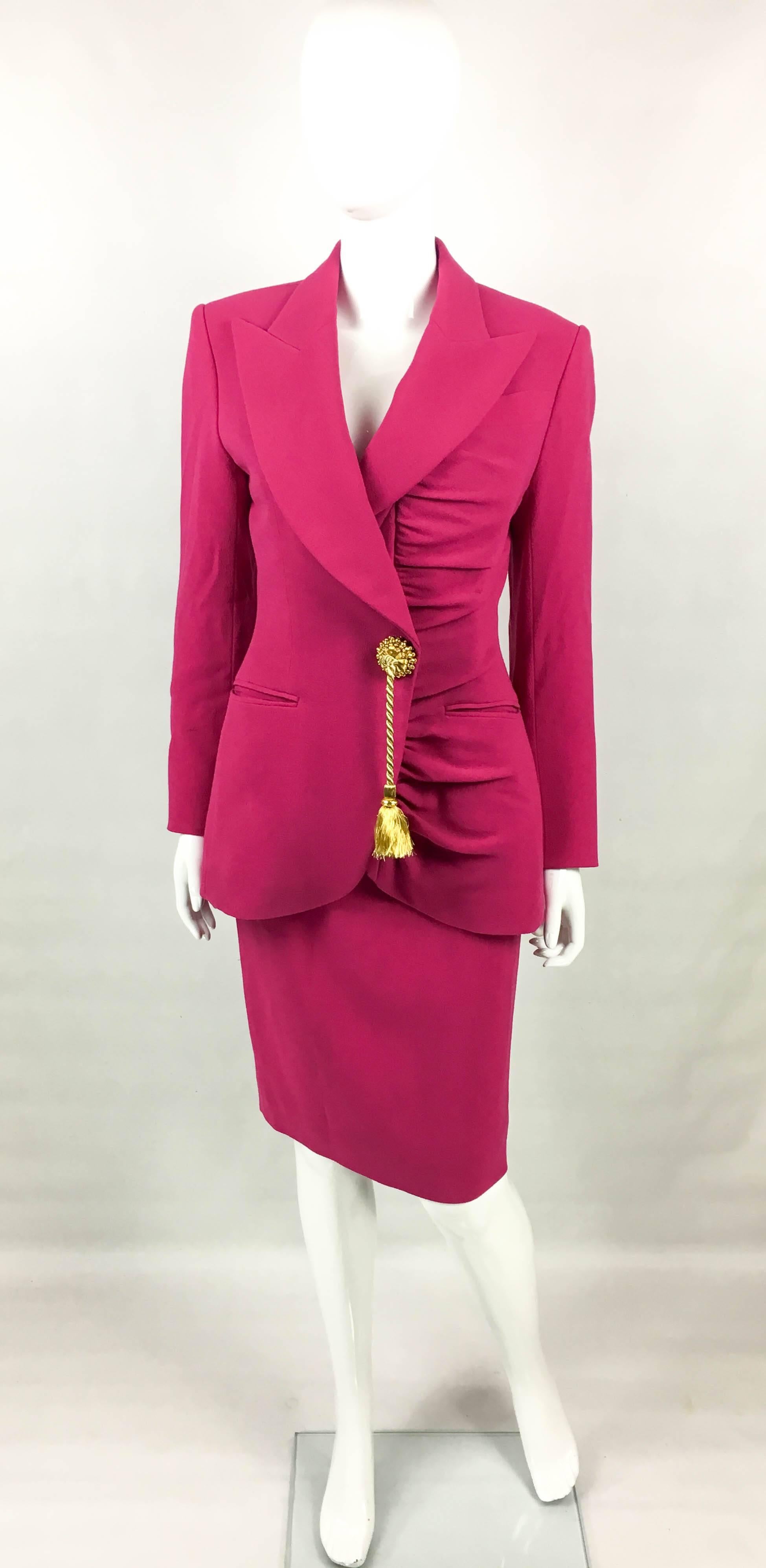 Stunning Vintage Dior Demi-Couture Wool Crepe Skirt Suit. This fabulous numbered ensemble by Dior was created in the 1980s. Both pieces are labelled and numbered – jacket: 53541; skirt: 22232. Made in shocking pink wool crepe, it is fully lined in