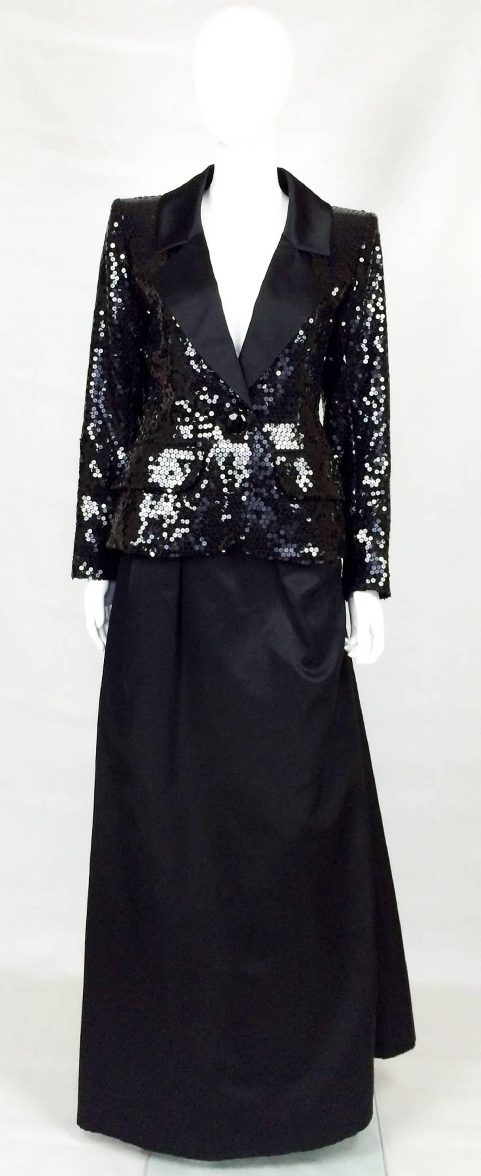 Spectacular Rare Vintage Yves Saint Laurent Le Smoking Sequin Evening Ensemble. This fabulous black Yves Saint Le Smoking ensemble comprises a sequin jacket, a floor-length skirt and a pencil skirt. The sequin jacket is truly stunning and current.