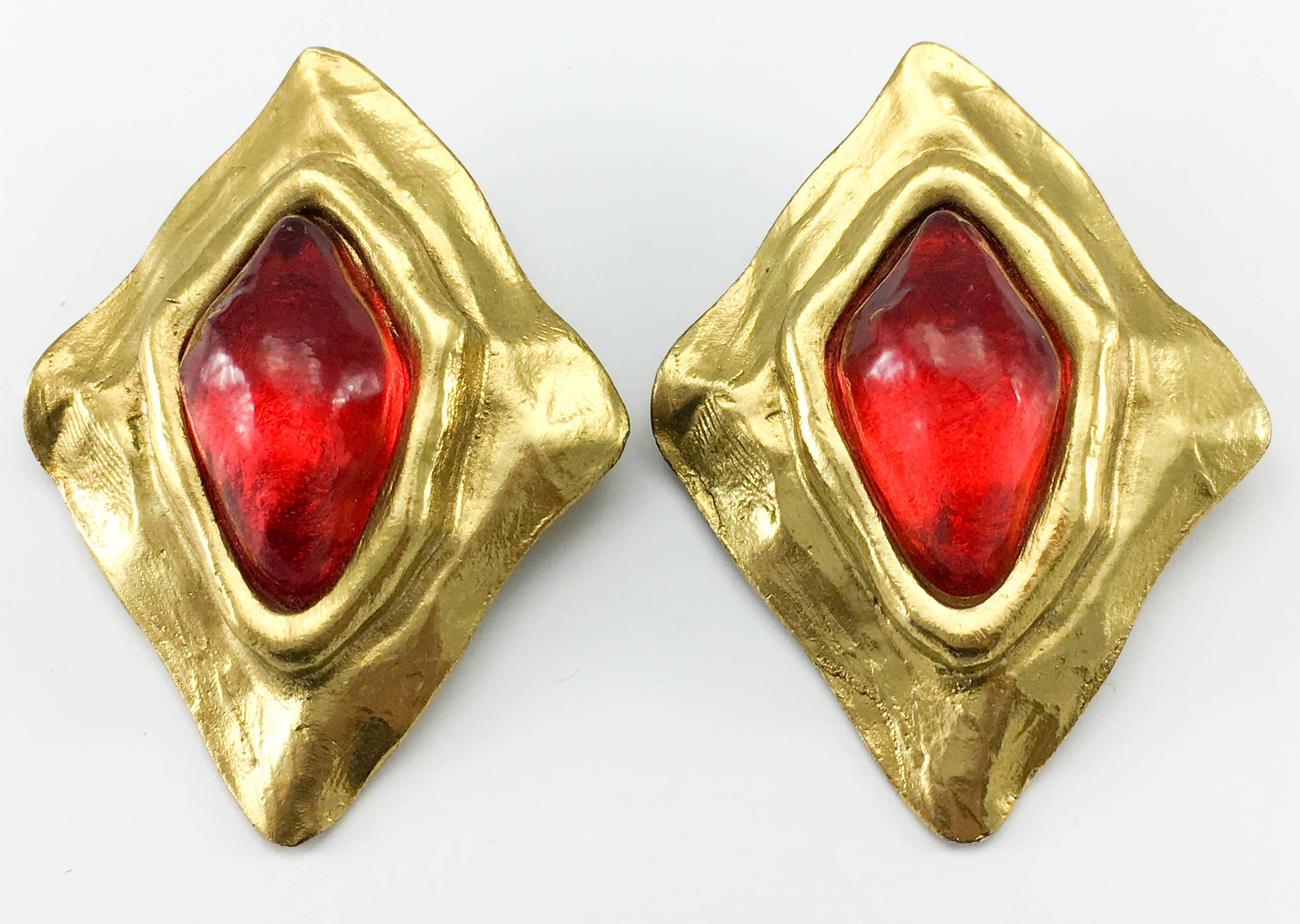 Vintage Yves Saint Laurent Gold Plated and Red Gripoix Clip-On Earrings. These striking Yves Saint Laurent earrings were created in the 1980’s by the legendary jewellery designer Robert Goossens. These large lozenge-shaped earrings feature is