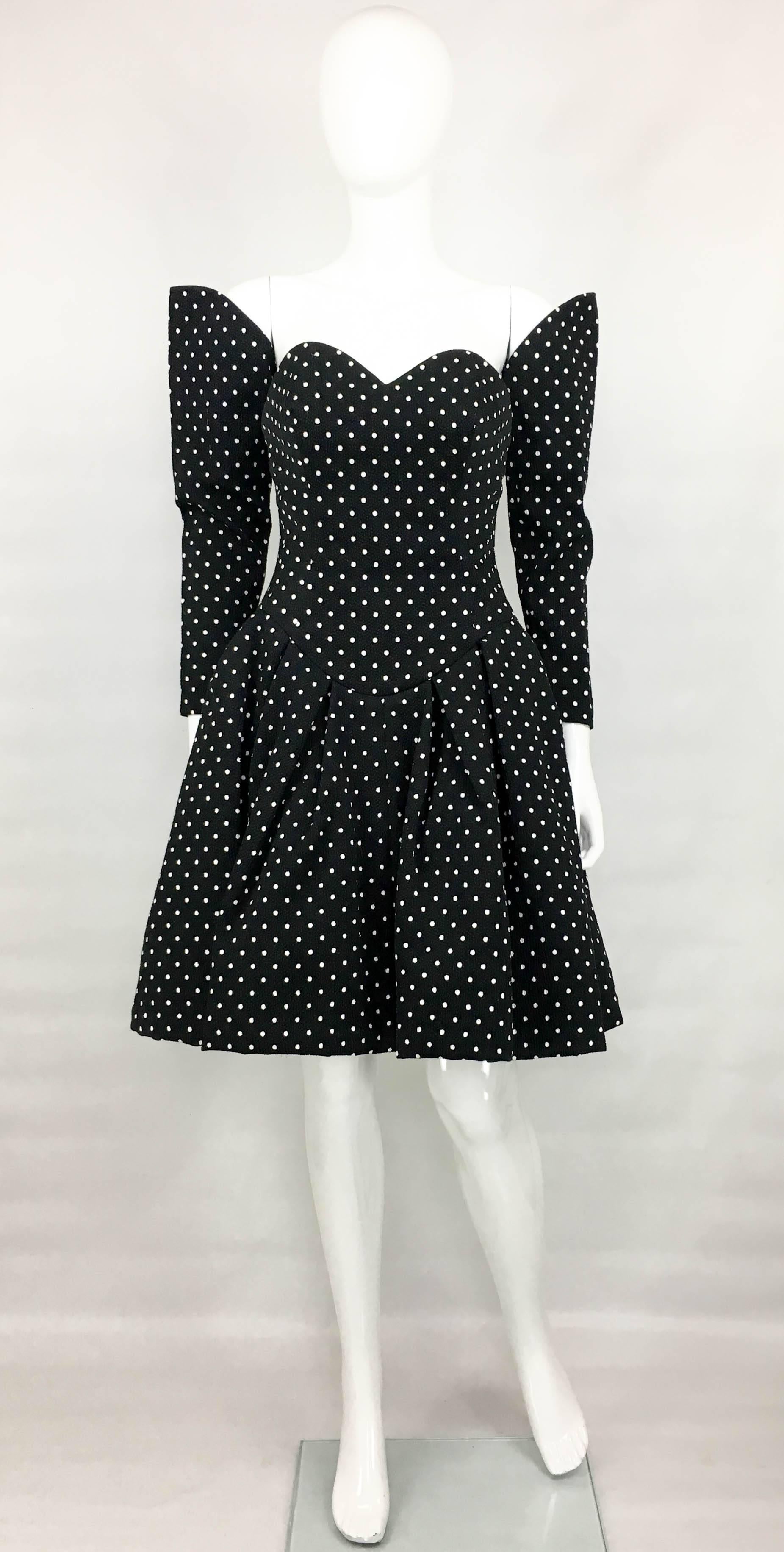 Vintage Lacroix Haute Couture Puffball Polka Dot Dress. This phenomenal strapless dress by Christian Lacroix dates back from the late 1980’s. Lacroix opened his Couture House in 1987 and shook the fashion world with his flamboyant and avantgarde