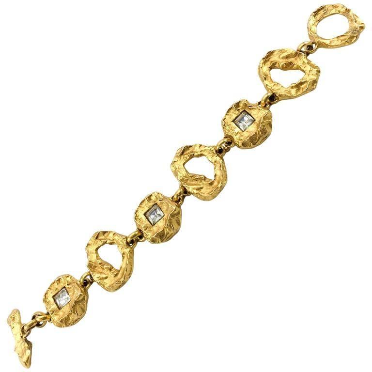 Striking Vintage Lacroix by Goossens Bracelet. This gorgeous Lacroix bracelet by Robert Goossens is gold plated and features Gripoix crystals. The design showcases the mastery of Maison Goossens in making jewellery and giving it an organic look and