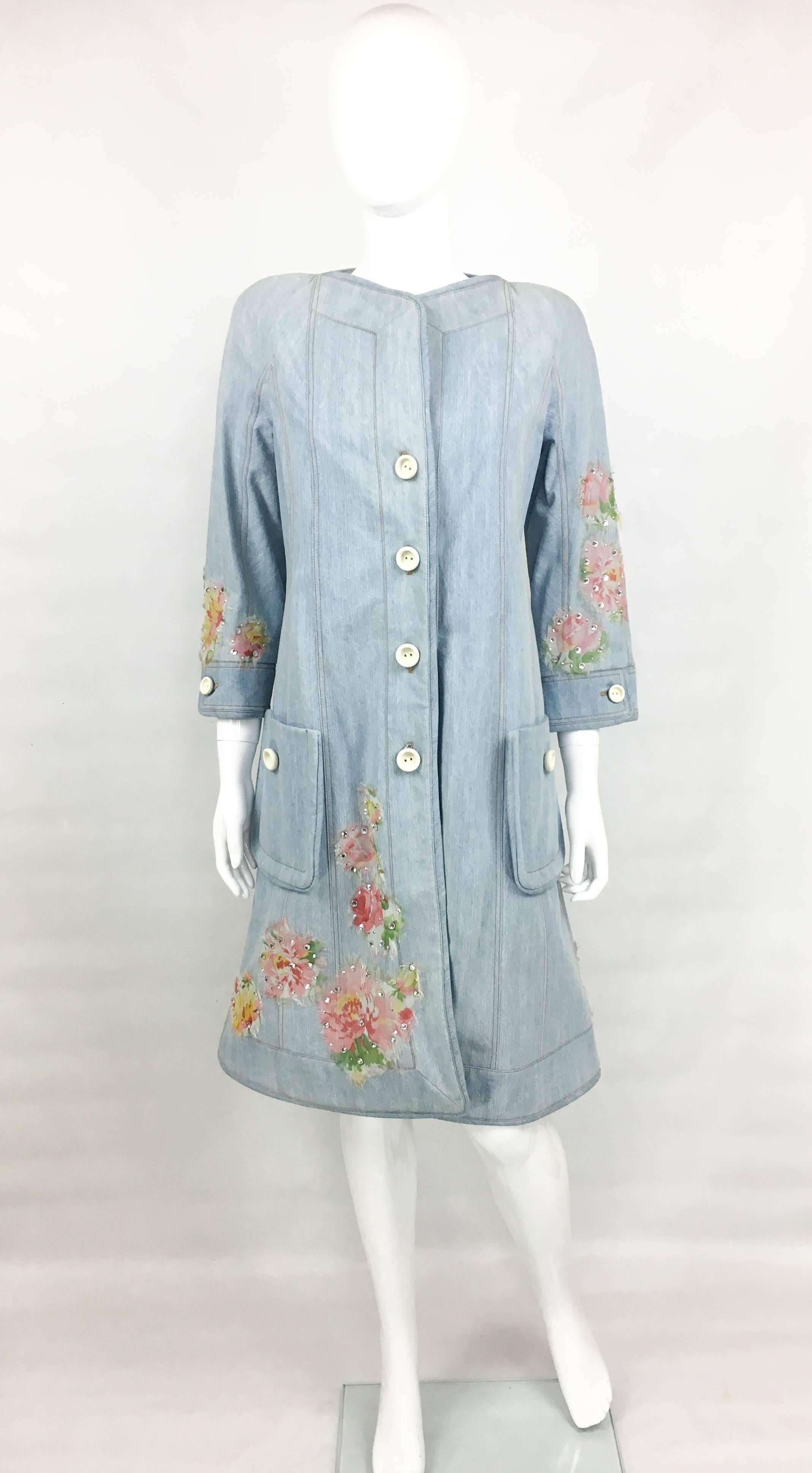 Dior Runway Look Denim Shirt Dress. This striking shirt dress by Dior was created by John Galliano for the 2005 Spring / Summer Runway Show (please refer to photos for a shot of a model wearing an identical dress on the runway). Made in denim, this