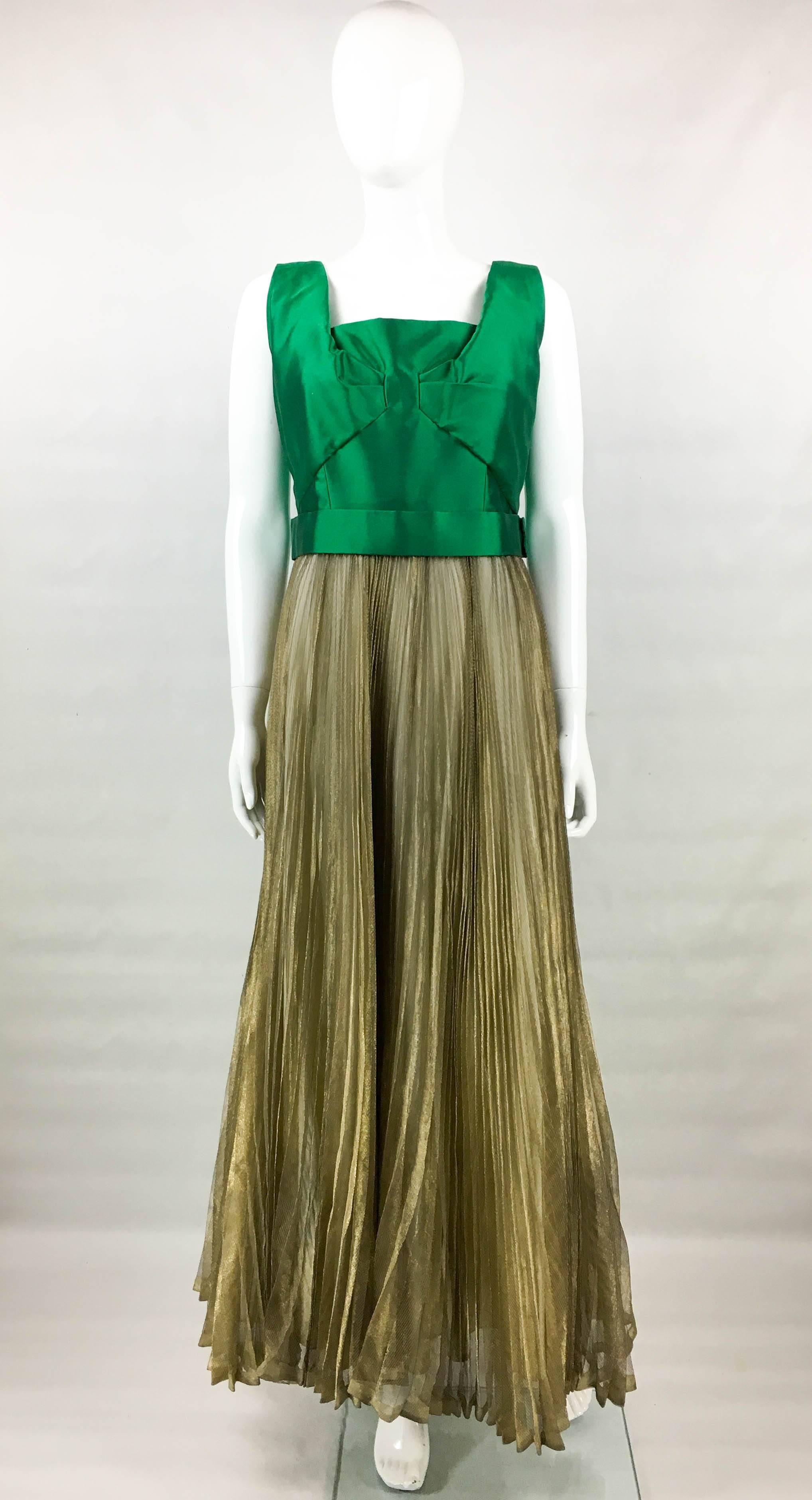 Vintage Lanvin Haute Couture Pleated Evening Gown. This stunning gown was created by Lanvin in the early 1960's (1962 - 1965). Labelled and numbered (24387), this one-of-a-kind piece carries all the haute couture staples such as impeccable