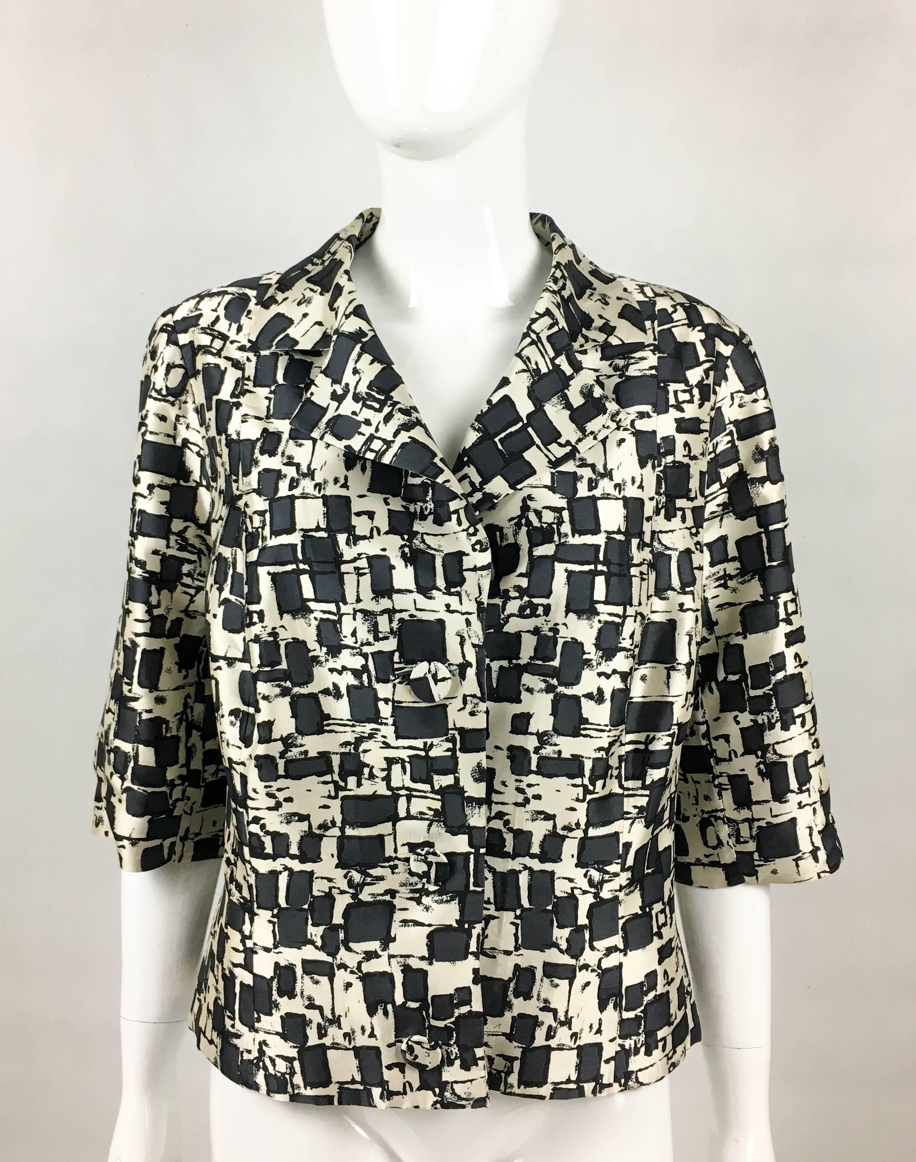 Chic Vintage Dior Couture Silk Jacket Silk. This very elegant jacket was designed by Marc Bohan for the Christian Dior Haute Couture Spring/Summer 1968 – numbered 93035. In silk, the off-white background print bears a grey and black abstract